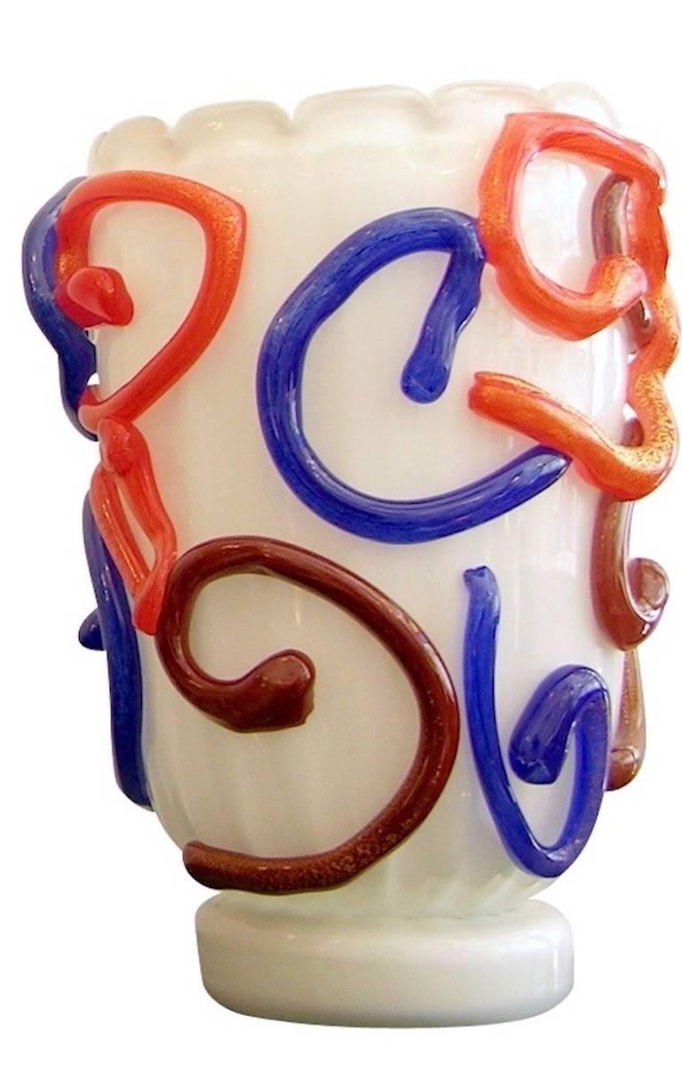 Fun Murano glass vase from the workshop of Costantini, high quality of the overlaid opalescent white glass waved bodies with scalloped edge, encased in clear glass, decorated like a modern painting with crafted colored glass swirls in relief worked