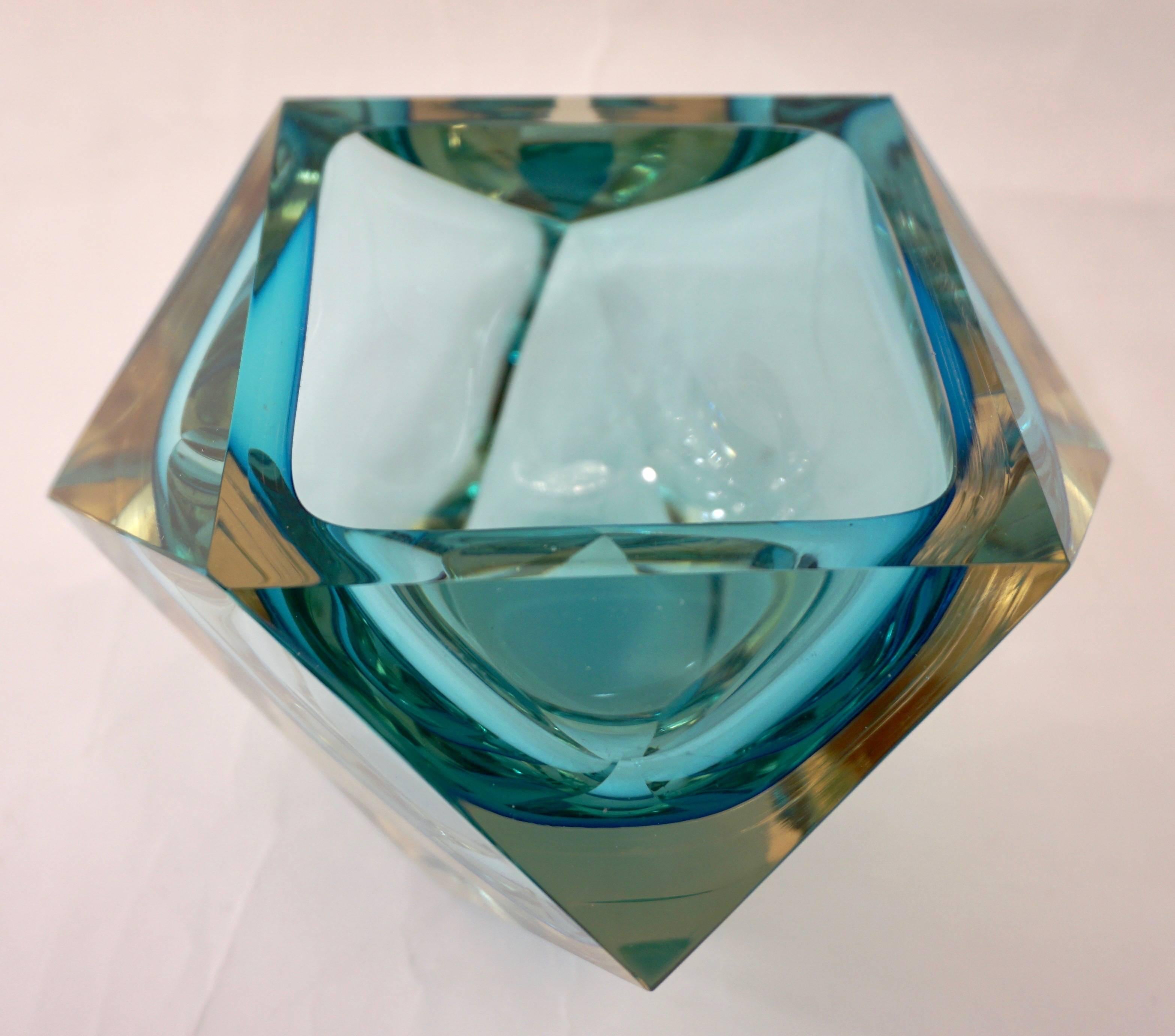 1950s, Italian diamond faceted art glass catchall/paperweight by Seguso in hand-cut Murano Glass, a very decorative bowl with a diamond multifaceted exterior which catches the light like a prism. This precious piece has a flat cut polished top with