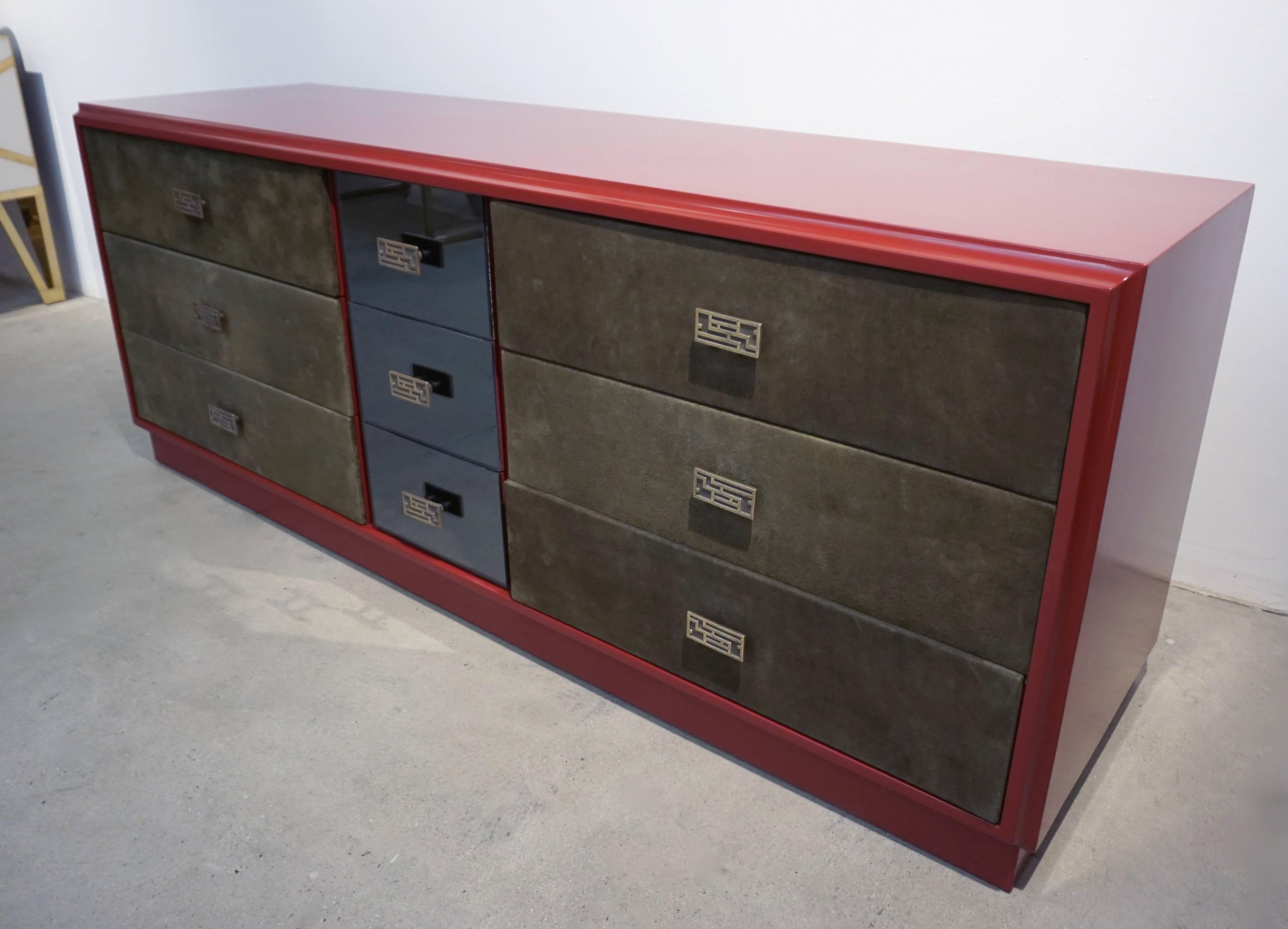 This nine-drawer vintage sideboard/credenza is a unique design attributed to Luciano Frigerio (Desio, 1928 – Sanremo 1999), an Italian designer, artist and musician. His pieces are distinguished by a great attention to details like the molded
