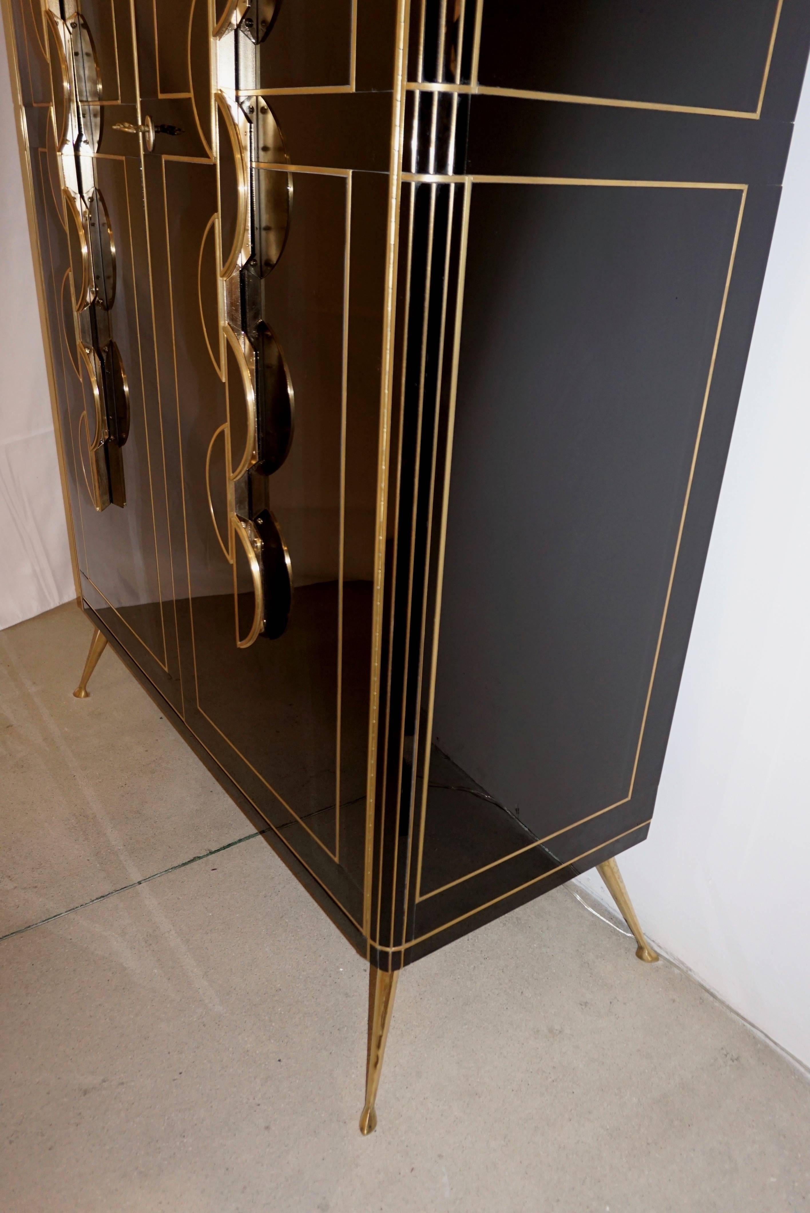 black and gold tall cabinet