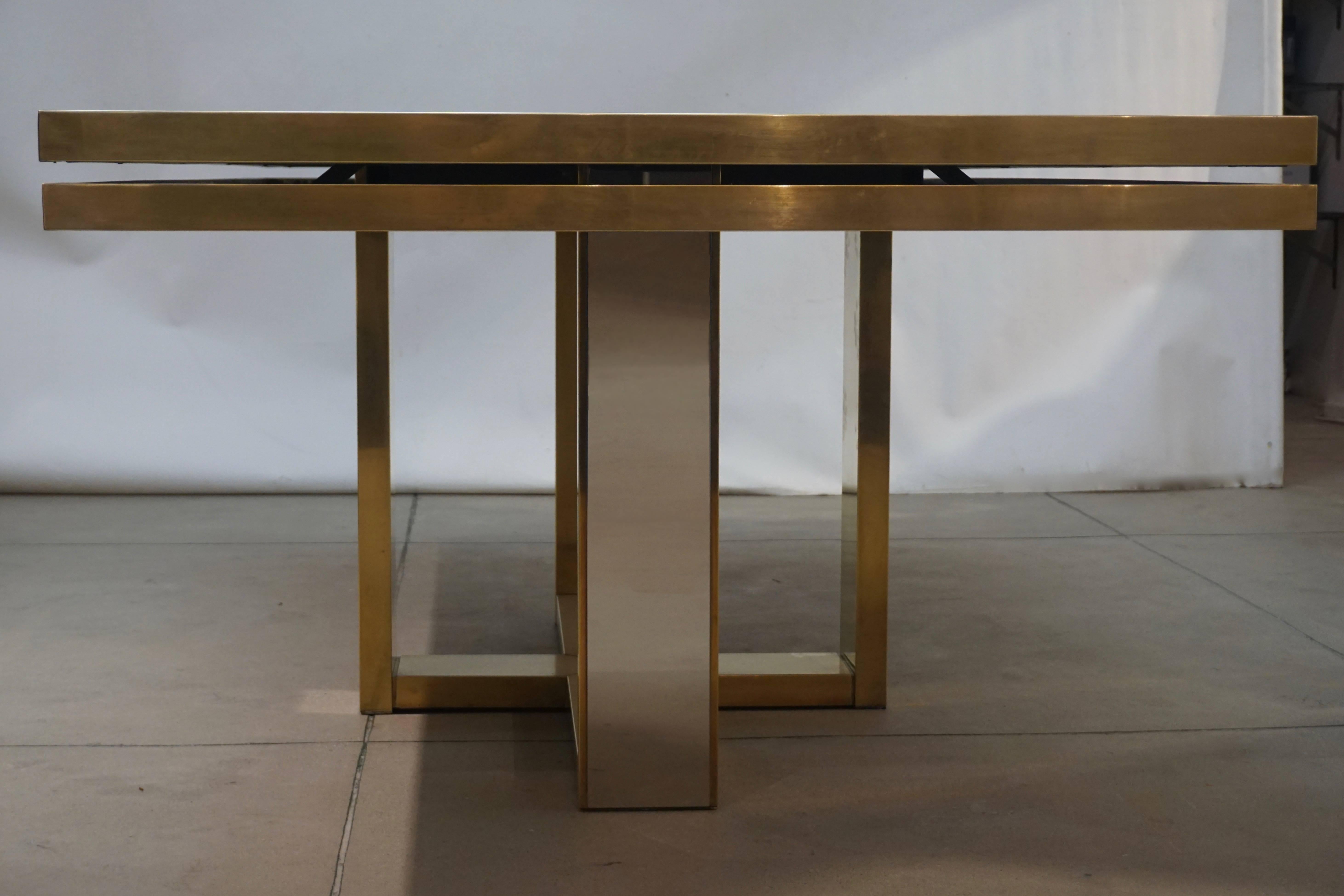 Vintage one of a kind Italian large dining, conference or hall table, exclusive sleek linear design by Giacomo Sinopoli, made by Liwan's, a Roman manufacturer, as described in the documentation. The brass double-frame top is decorated with a