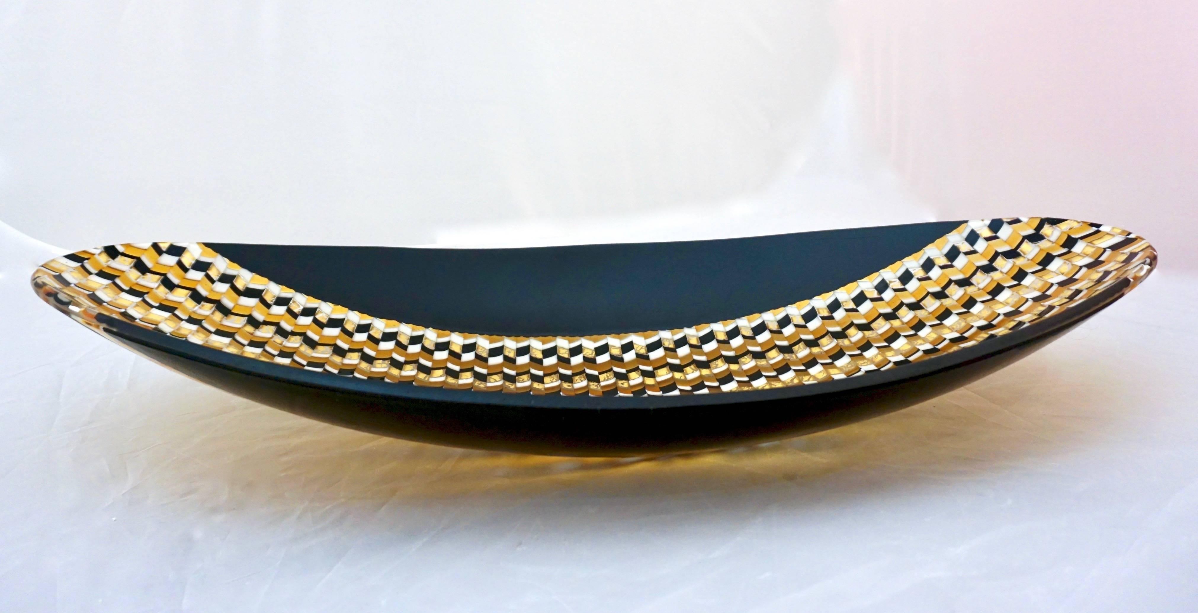 Contemporary Art Deco design black and gold Murano glass centerpiece, with an organic herringbone decor, a pattern inspired by the Venetian Arsenal where the cluster of stockyard roofs present the same geometry, made precious with 24-karat gold,