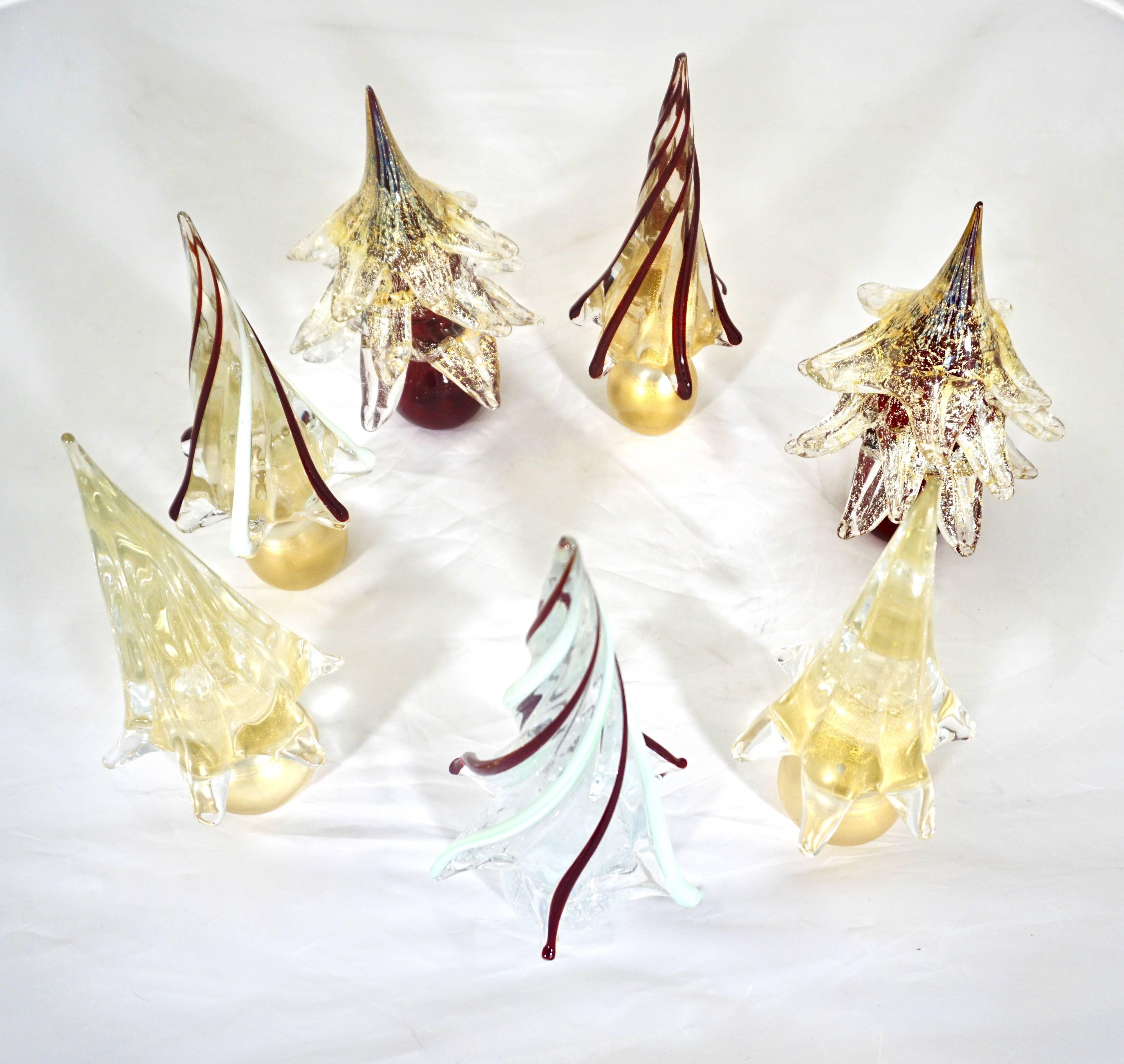 These Murano glass trees of organic sleek modern design, a vintage creation by the Venetian company Formia, signed pieces, are each individually mouth blown and handcrafted. Each is made precious by the use of extensive pure 24-karat gold and