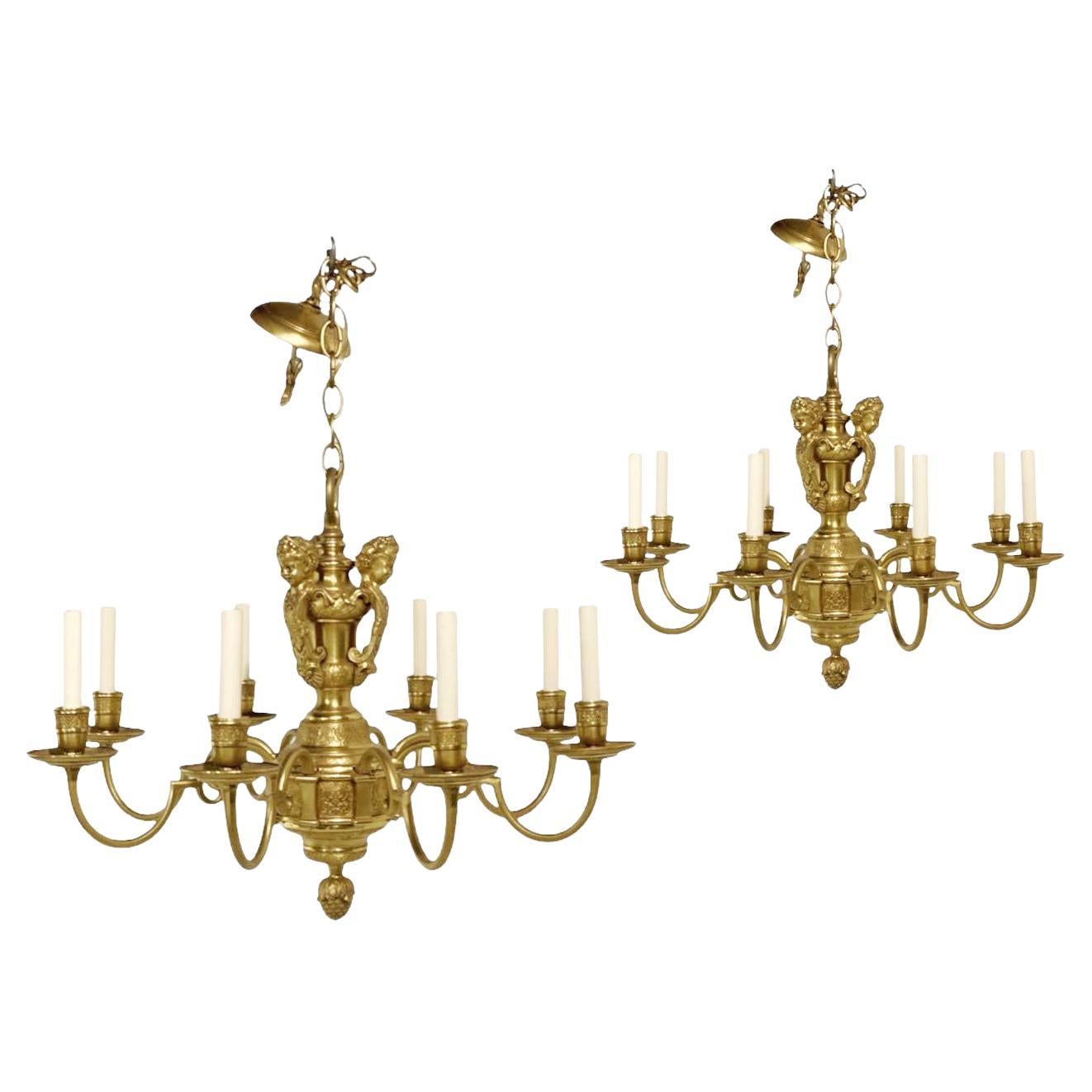 A pair of circa 1900's Caldwell Neoclassic gilt bronze chandelier with cherubs atop and engraved body. Available pair, also in one chandelier in silver finish
