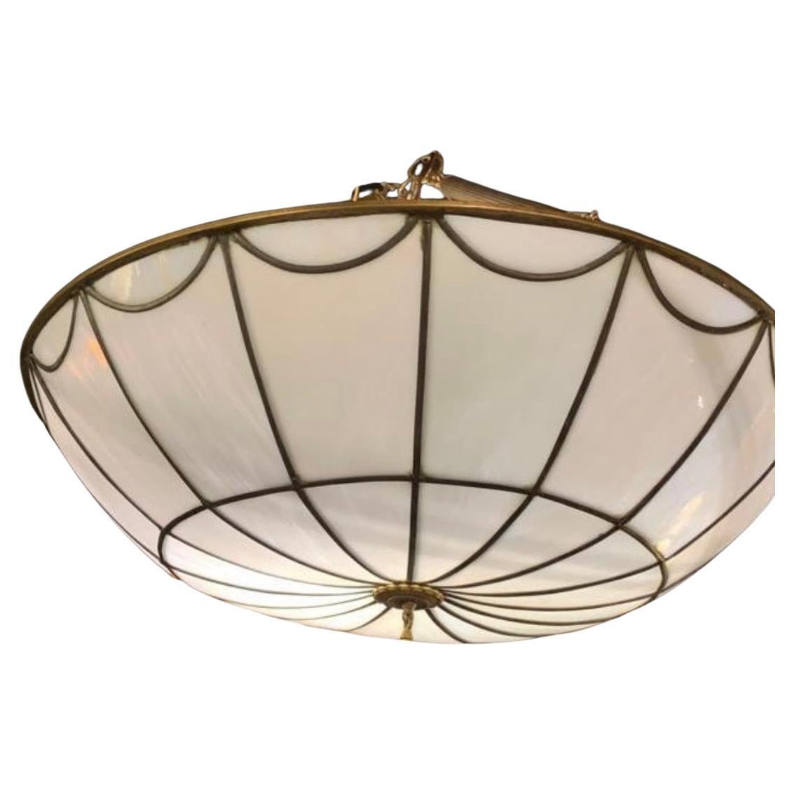A circa 1920's large leaded glass light fixture with 8-10 interior lights.