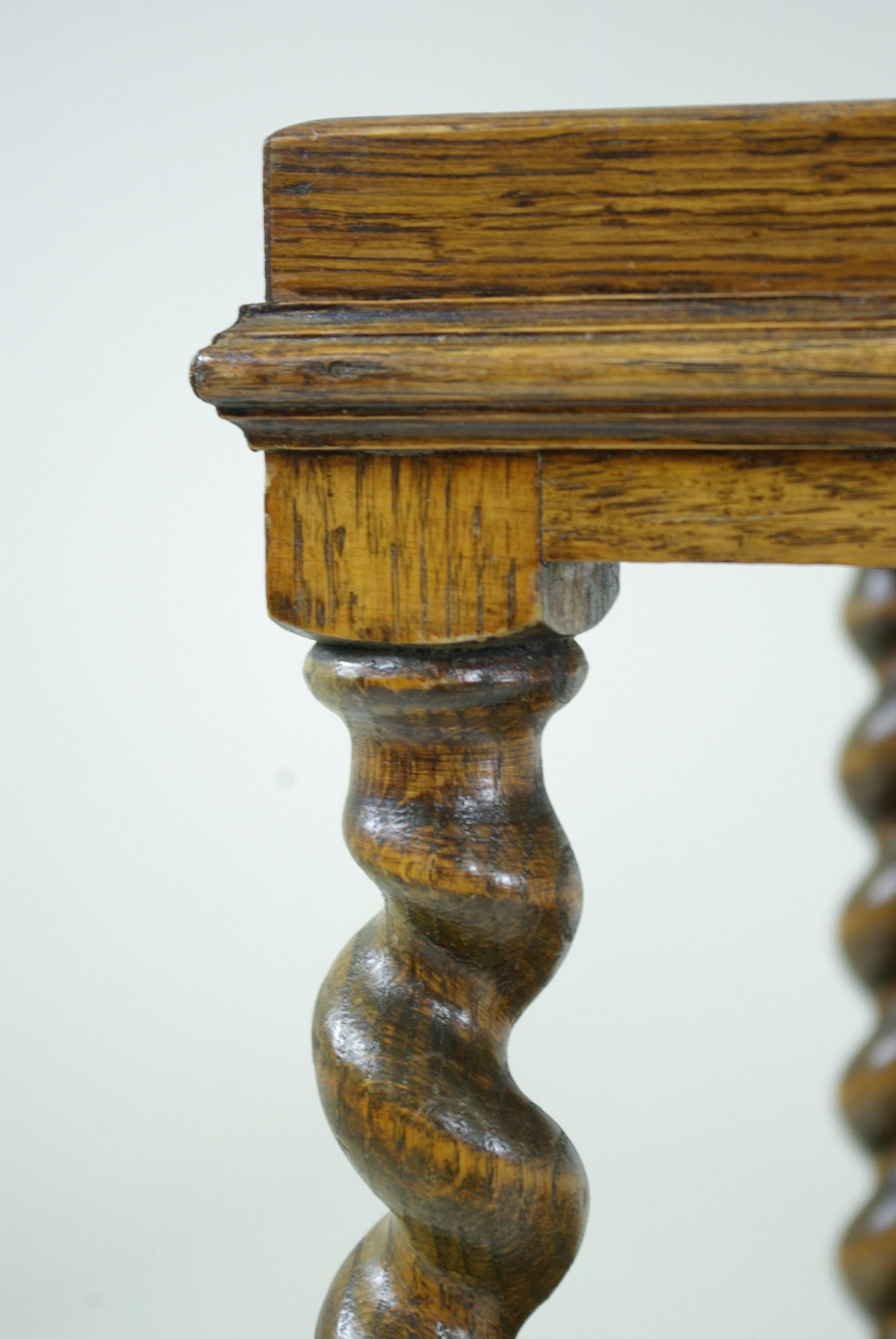 Scotland, 1920.
Solid oak construction.
Thick barley twist supports.
Original finish, warm patina.
All joints are solid.
Wonderful piece of furniture.

$850.

Lot B-264.
Measures: 36 1/2