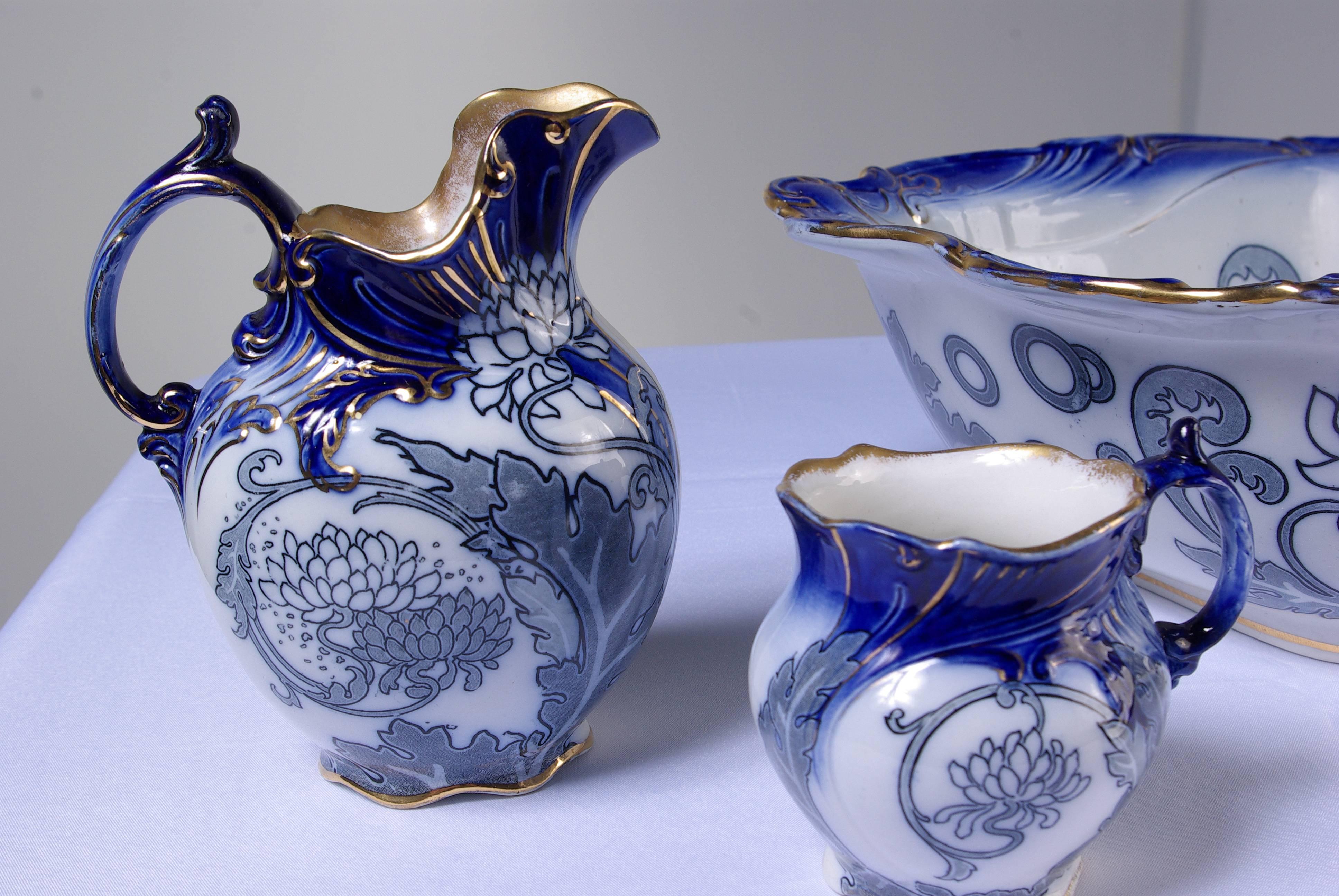 
Our item B362 is a set of four antique Royal Doulton pieces featuring, in floral blue, a pitcher, a wash basin, jug and mug. Each piece is of wonderful quality and condition with no chips, cracks or repairs. It is rare to locate a set of such