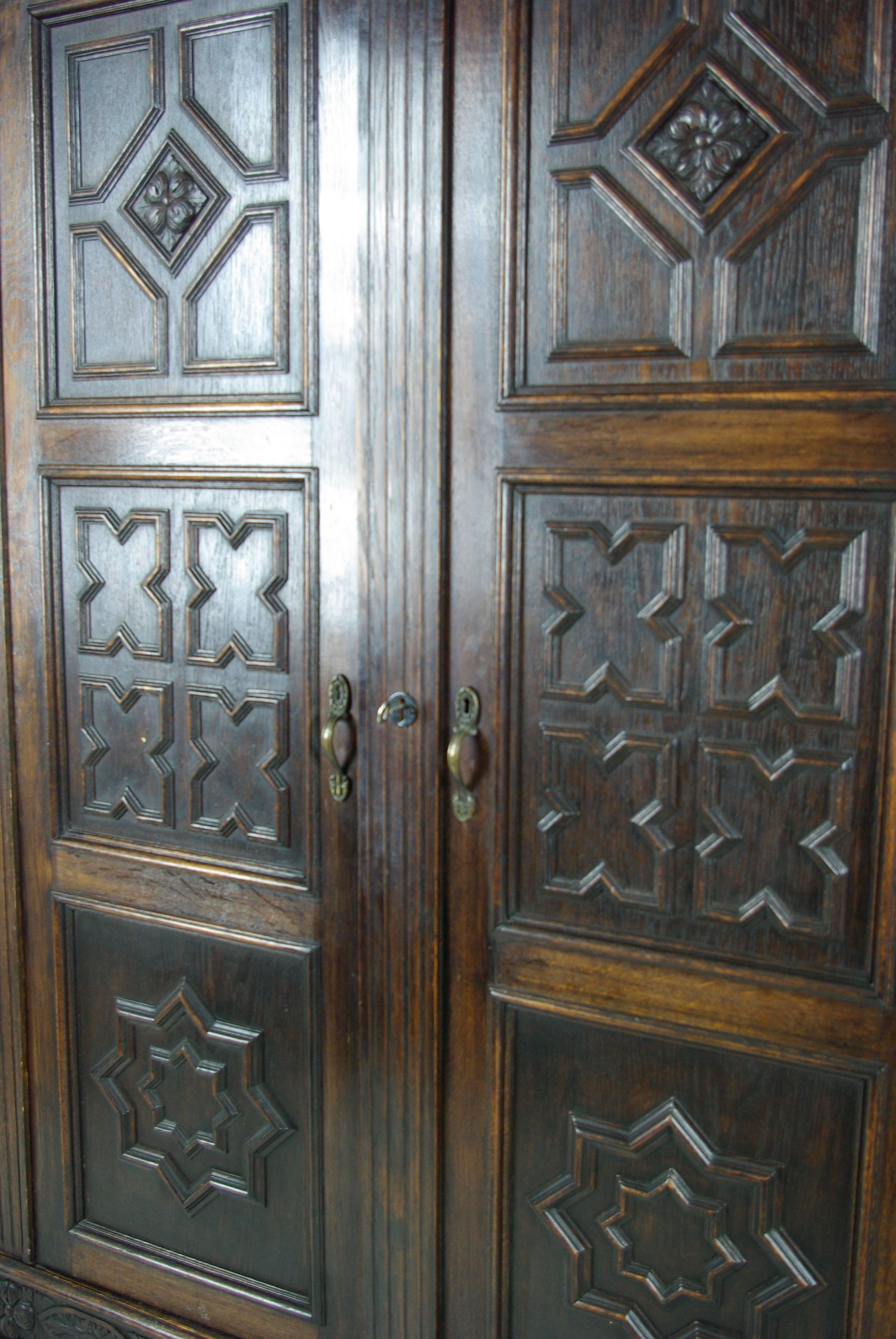 Antique Scottish Heavily Carved Oak Armoire, Wardrobe, Closet In Excellent Condition In Vancouver, BC