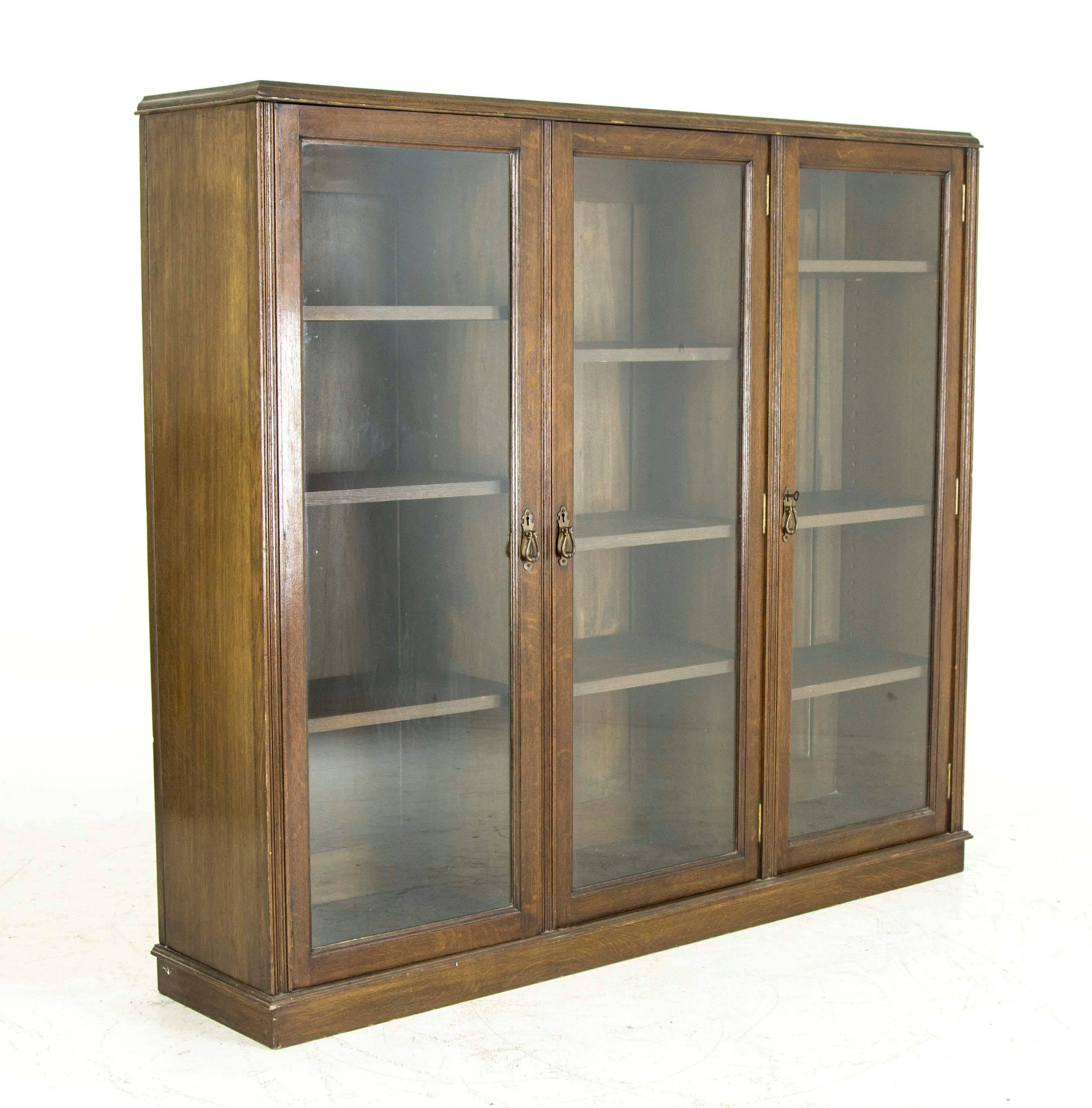 Scotland
1920
Solid oak construction
Original dark medium oak finish
Nine adjustable shelves
Very heavy bookcase
All original glass and locks

$950

B438
Measures: 58