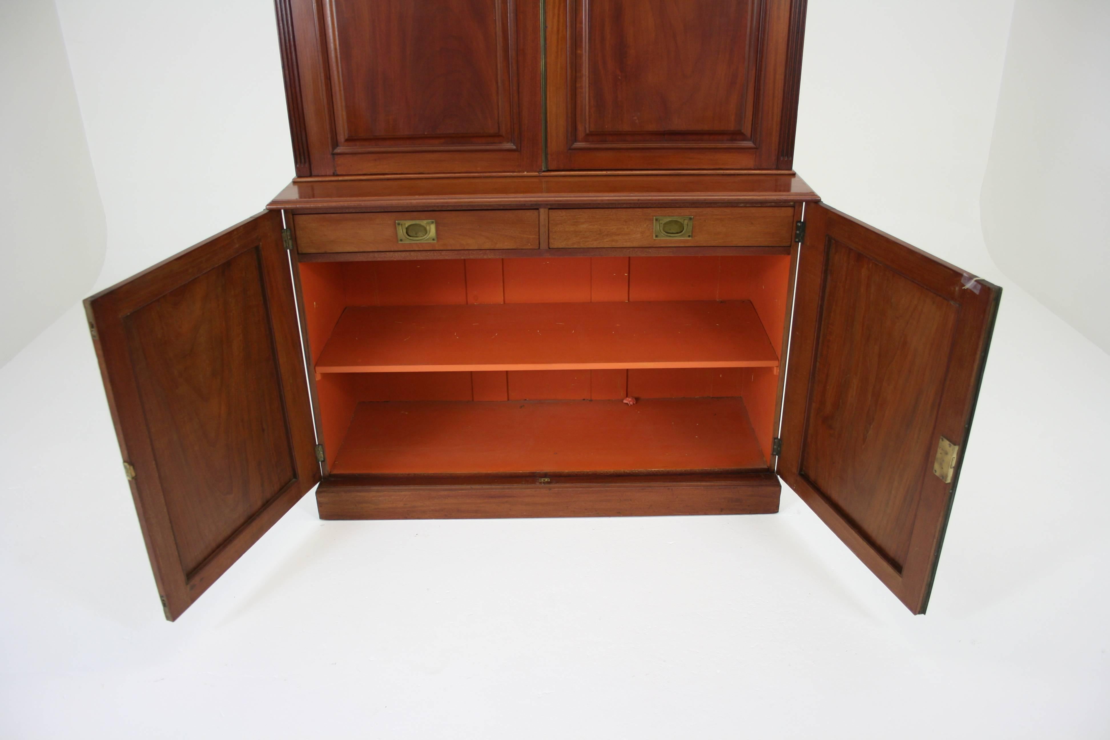 Office cabinet antique bookcase antique mahogany postal cabinet B775

Scotland
1870
Solid mahogany construction
All original, painted top interior
Two panelled doors above fitted with adjustable shelves interior
Two panelled doors below