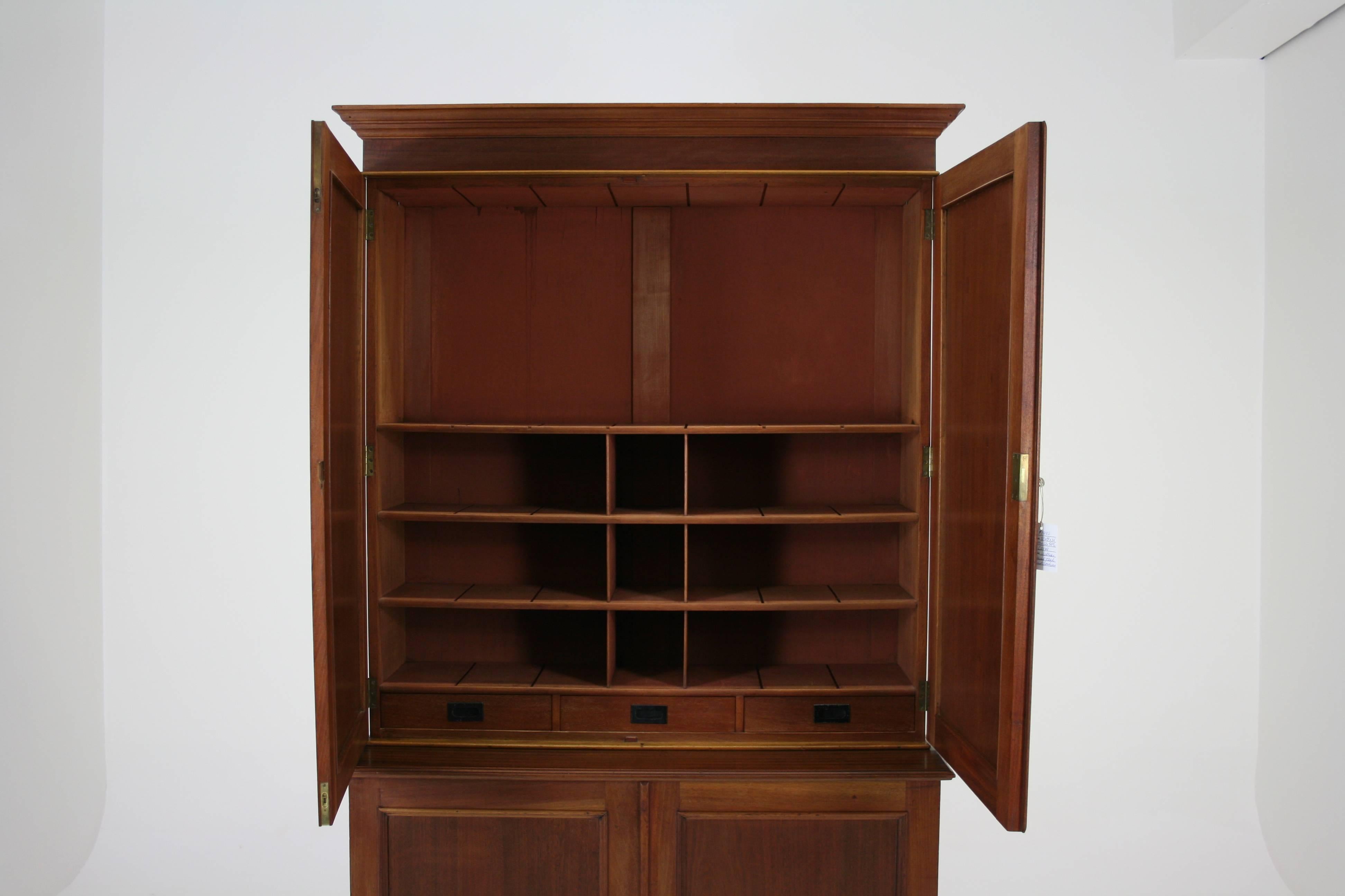 Scotland
1870
Solid mahogany construction
All original
Two panelled doors above fitted with various compartments and three drawers
Two panelled doors below fitted with two larger drawers and two shelves
Separates into two pieces for