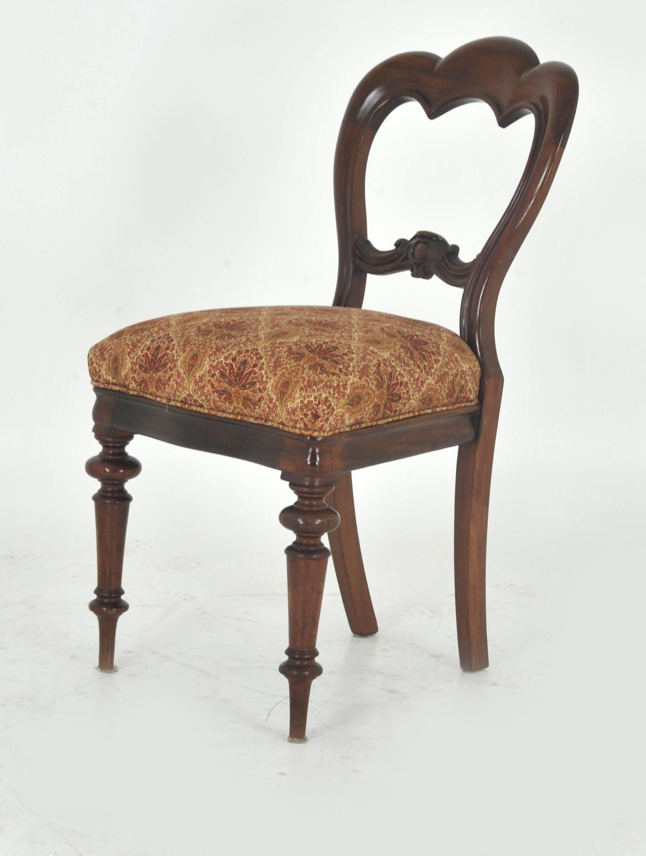 Antique Dining Chairs, Victorian, Balloon Back, Walnut, Set of Six, Scotland 1860, B830

Scotland, 1860
Solid walnut with original finish
Fan back has a carved lower rail
Padded lift out seat
Standing on turned fluted legs to the front, out swept