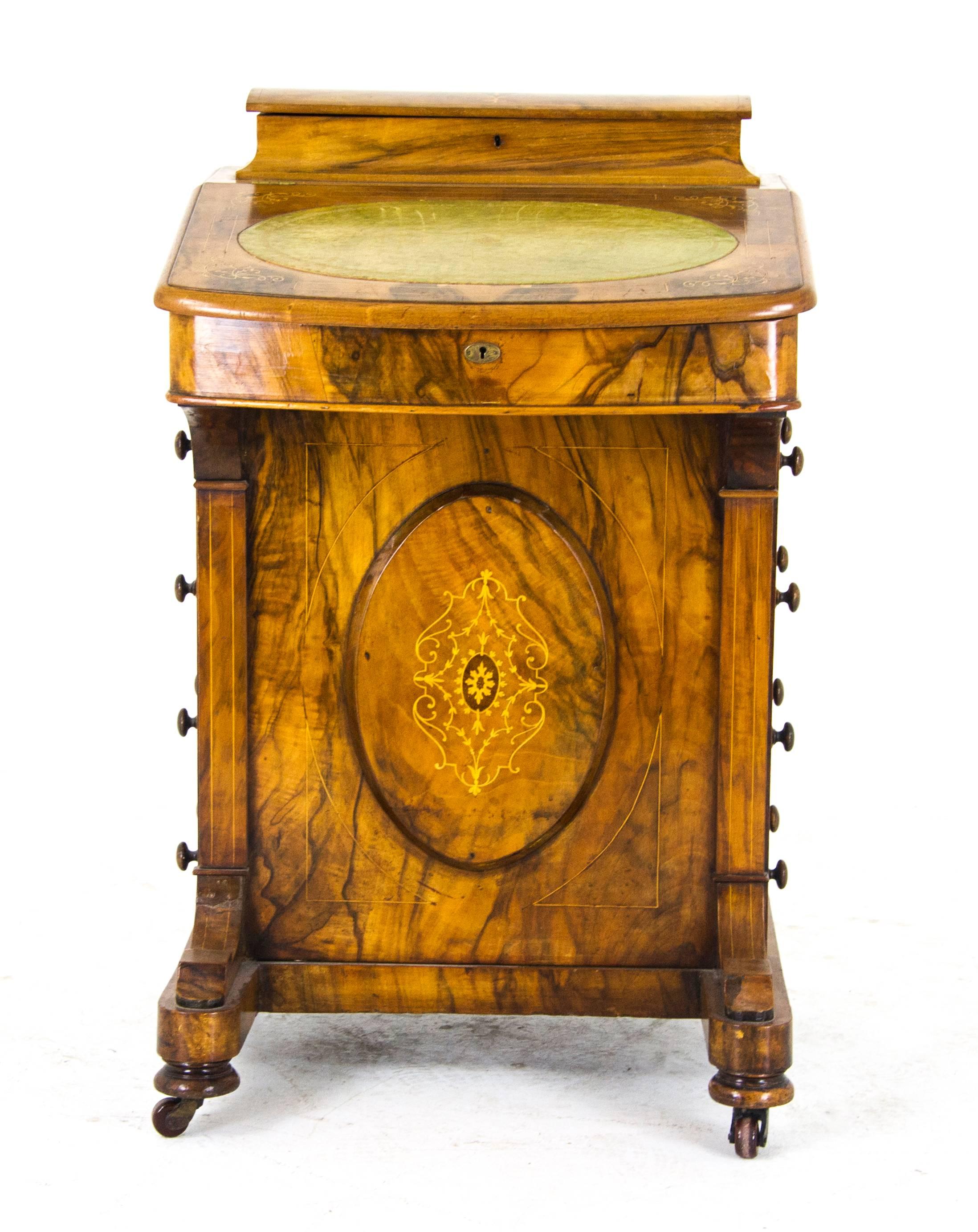 Scotland, 1860
Original finish
Attractive grain in the burr walnut
Highlighted with crossband in ebony and boxwood stringing
Inlaid lift top with fitted interior
Inlaid slant top with embossed leather
Fitted interior with single drawer and