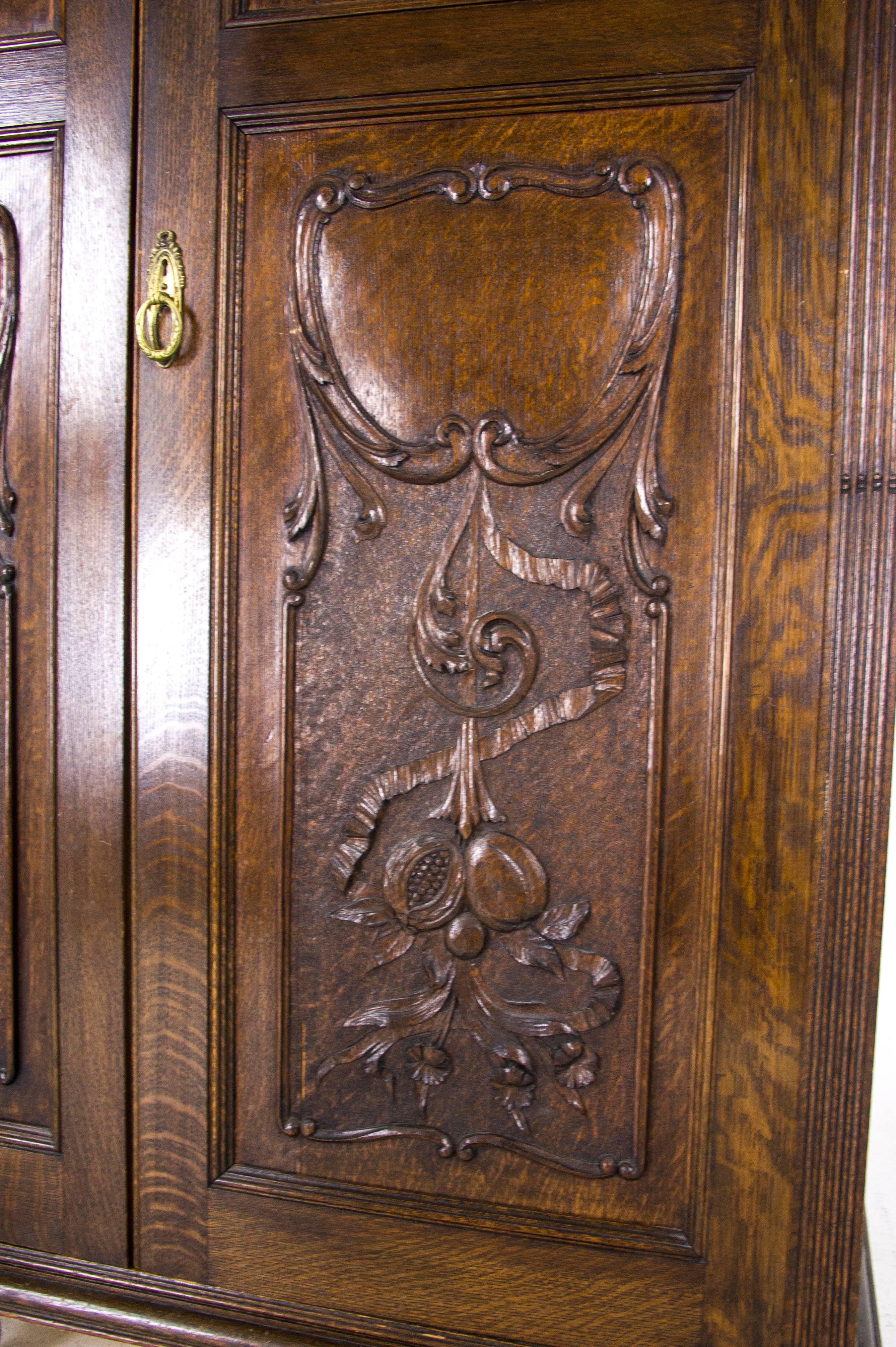 Hand-Carved Antique Armoire Heavily Carved Tiger Oak Scotland, 1890
