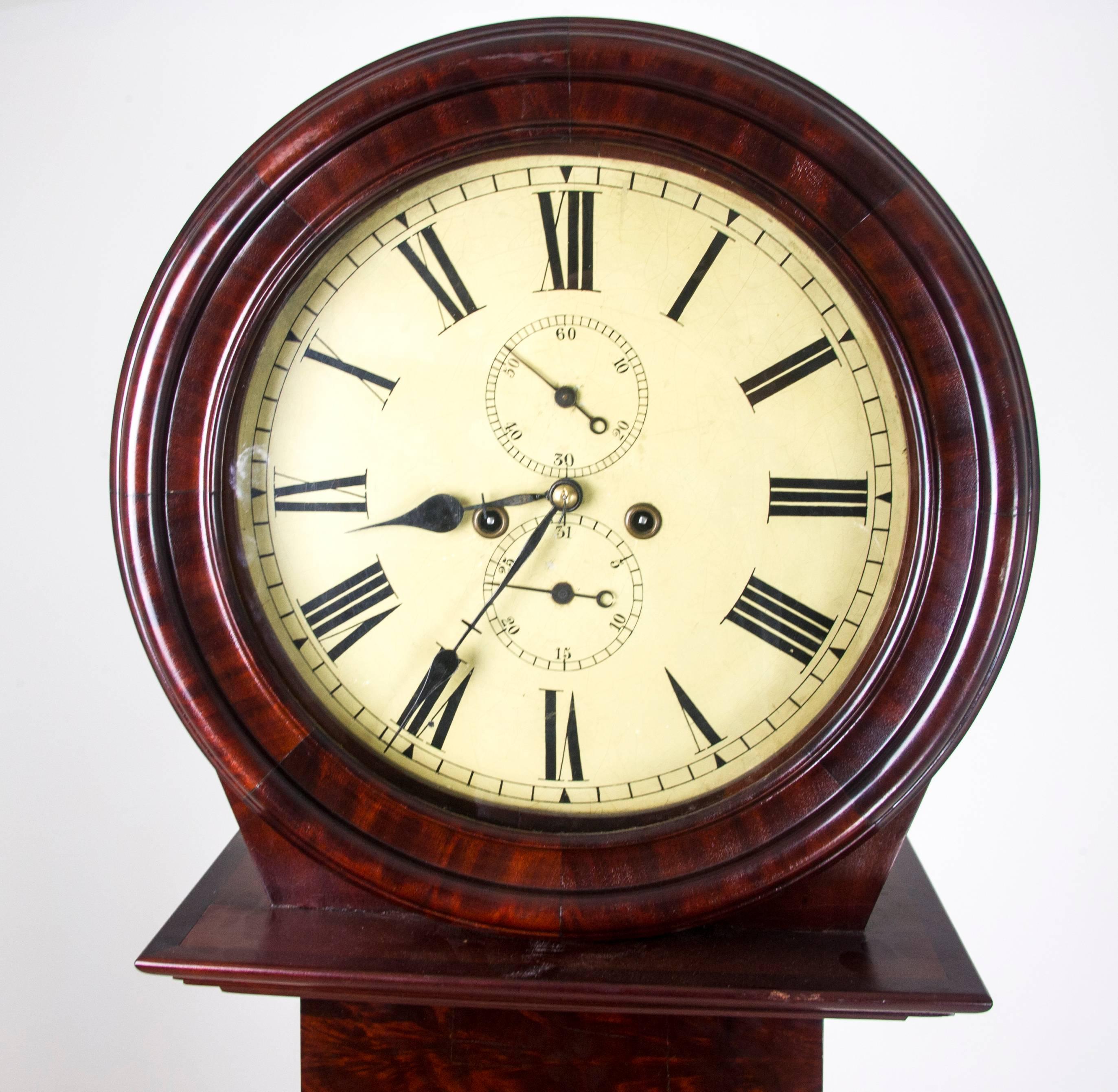 Antique long case clock drumhead grandfather clock 8 day movement, Scotland, 1860.

Scotland, 1860.
Drumhead hood with molded surround
12