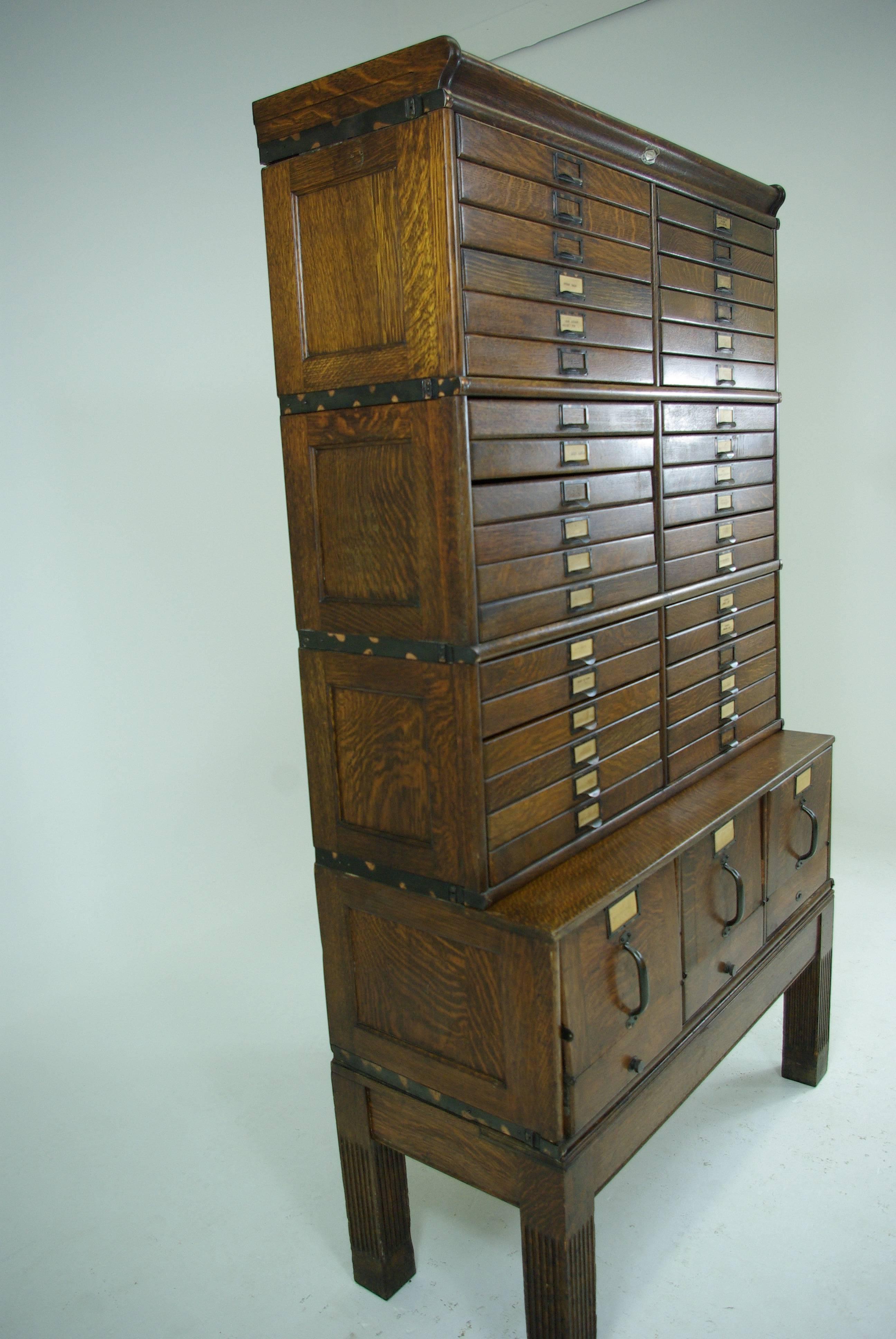 Canada, 1920.
Quarter sawn oak.
Original finish.
Cabinet comes in three main sections plus top and base.
No damage or repair.
Missing single rod on file drawer.

$2950.

Lot B-275.
Measures: 41 1/2