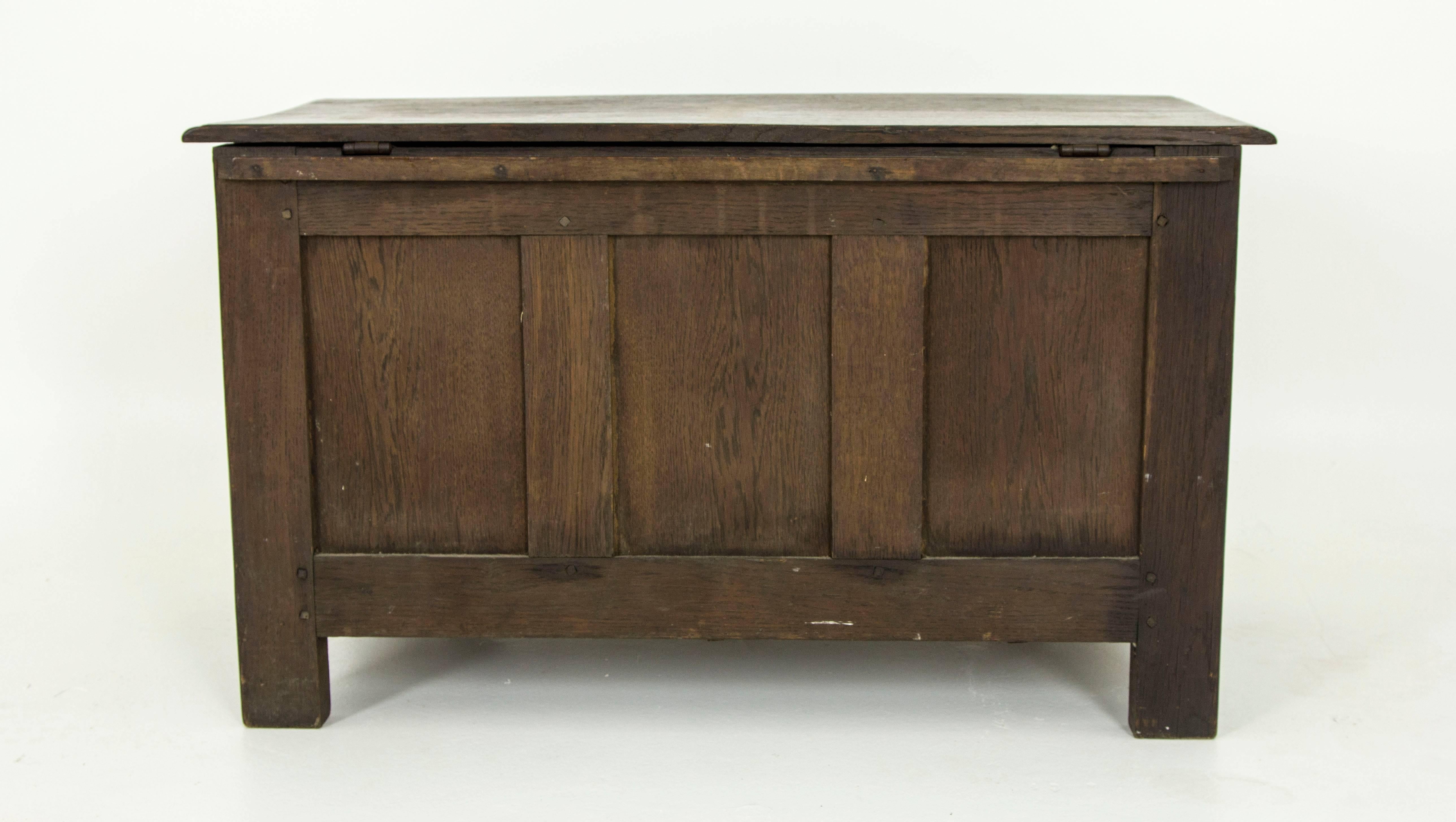 This antique oak blanket box was hand-carved in oak nearly 150 years ago. This is an heirloom quality chest that is bound to be an asset to any decor. 

Scotland, 1880
Solid oak construction
Original finish
Three panel front with carved top and