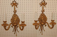 Elegant Pair of Louis XV French Style Gilt Bronze Two-Light Wall Sconces