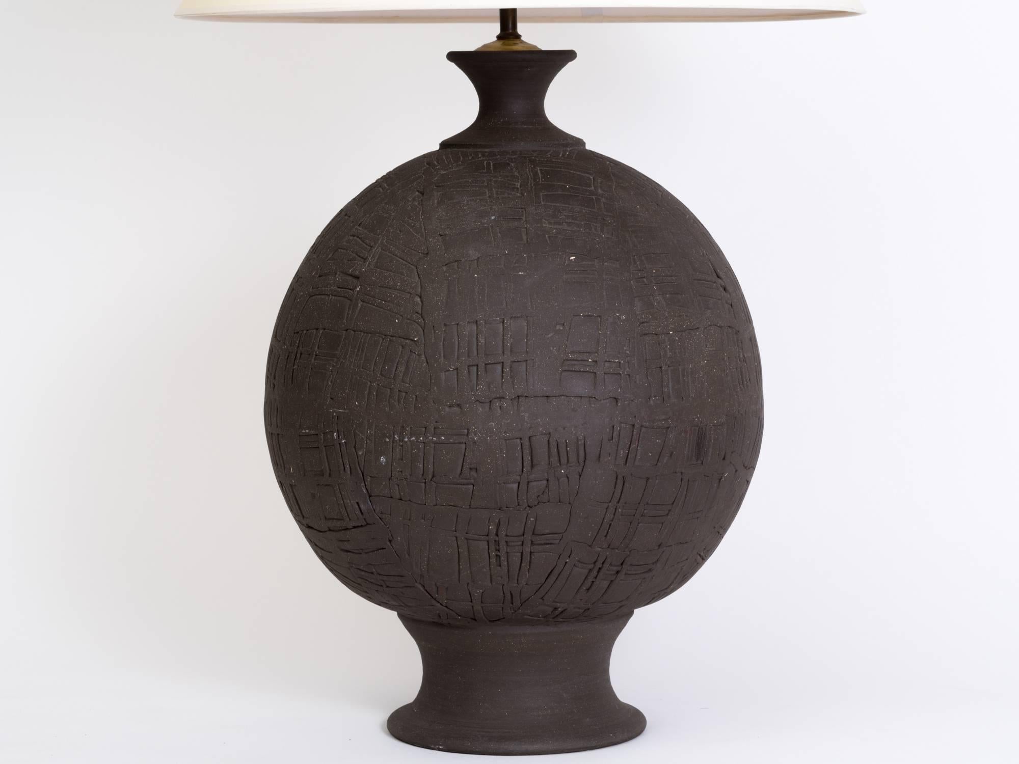 Monumental art pottery sphere lamp on hand thrown pedestal base. Newly rewired. Measures: 39