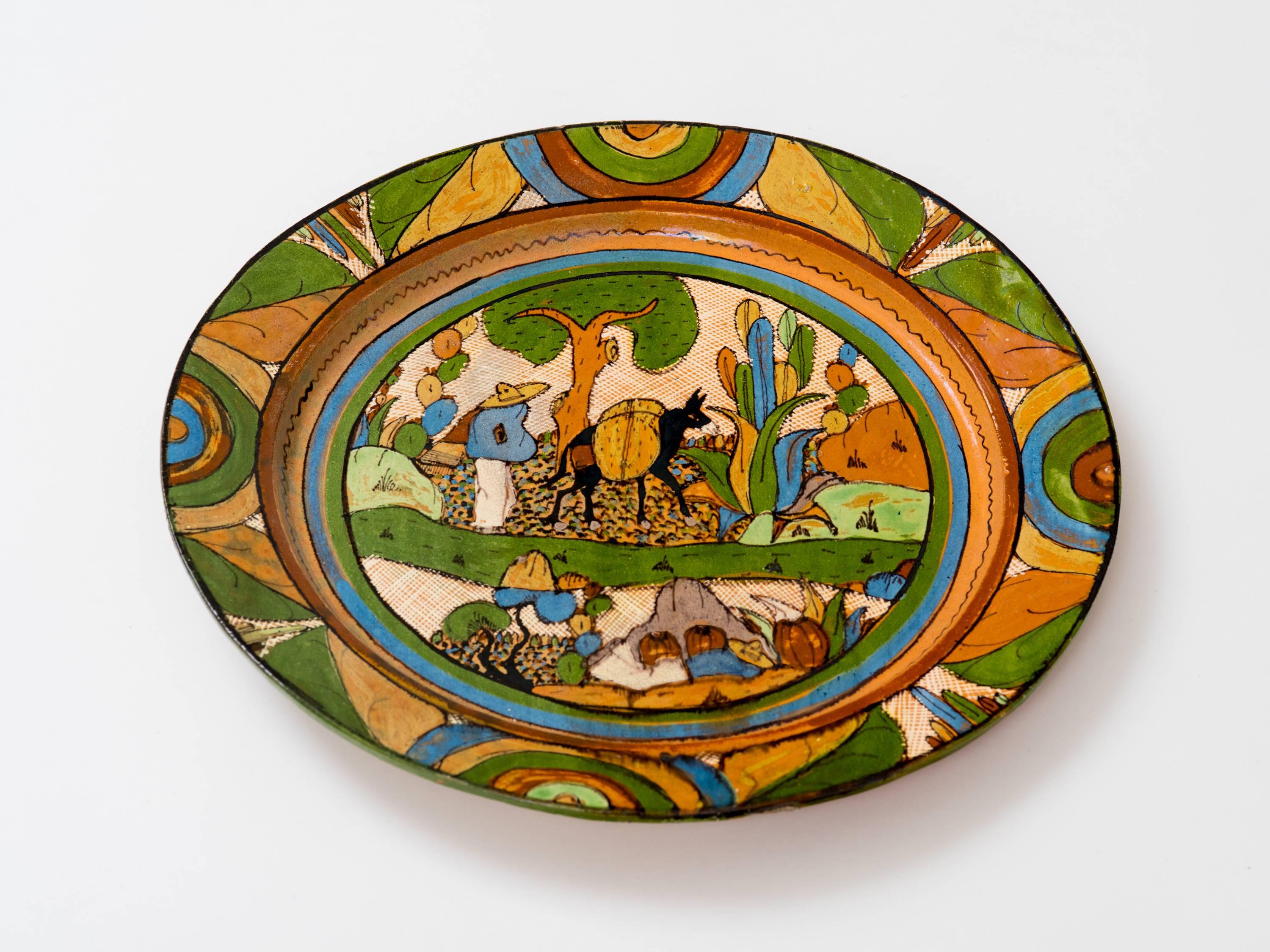 Wonderful piece of 1930s over glazed ceramic finely painted with scene of Old Mexico. hand-painted with natural mineral pigments in Tlaquepaque. Wire on back for hanging. Stamped on reverse, Made In Mexico.