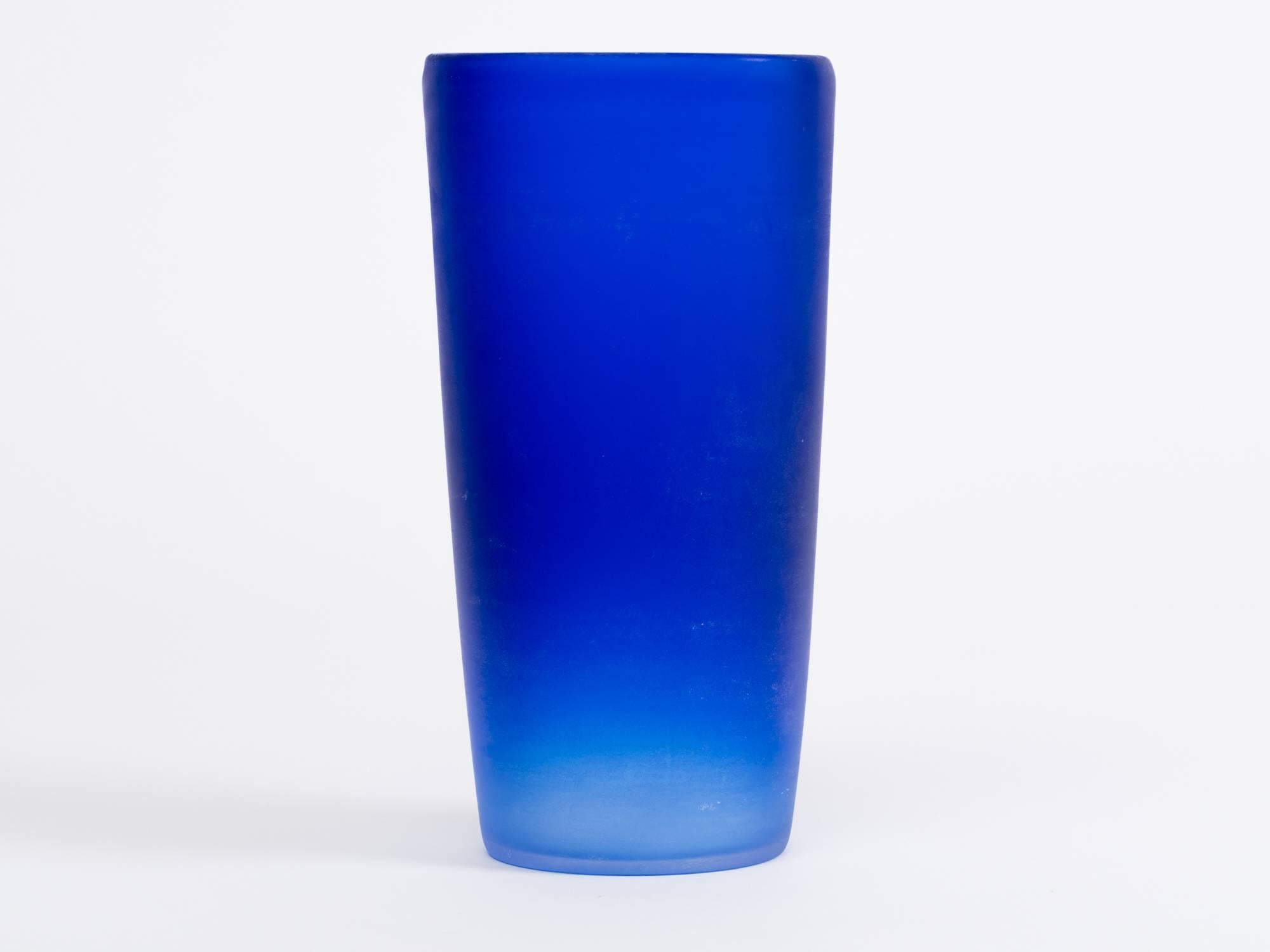 Solid cobalt blue Italian glass vase with gradient hues. Handcrafted in the Cenedese workshop, Murano, Italy,c. 1980's. 
Engraved signature to bottom,  Cenedese. 

After World War II, in 1946, after being tutored by various glass masters, 
Mr. Gino