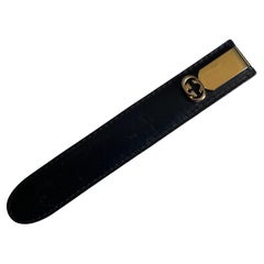 Brieföffner aus Gold und Metall von Gucci in schwarzem Ledergehäuse