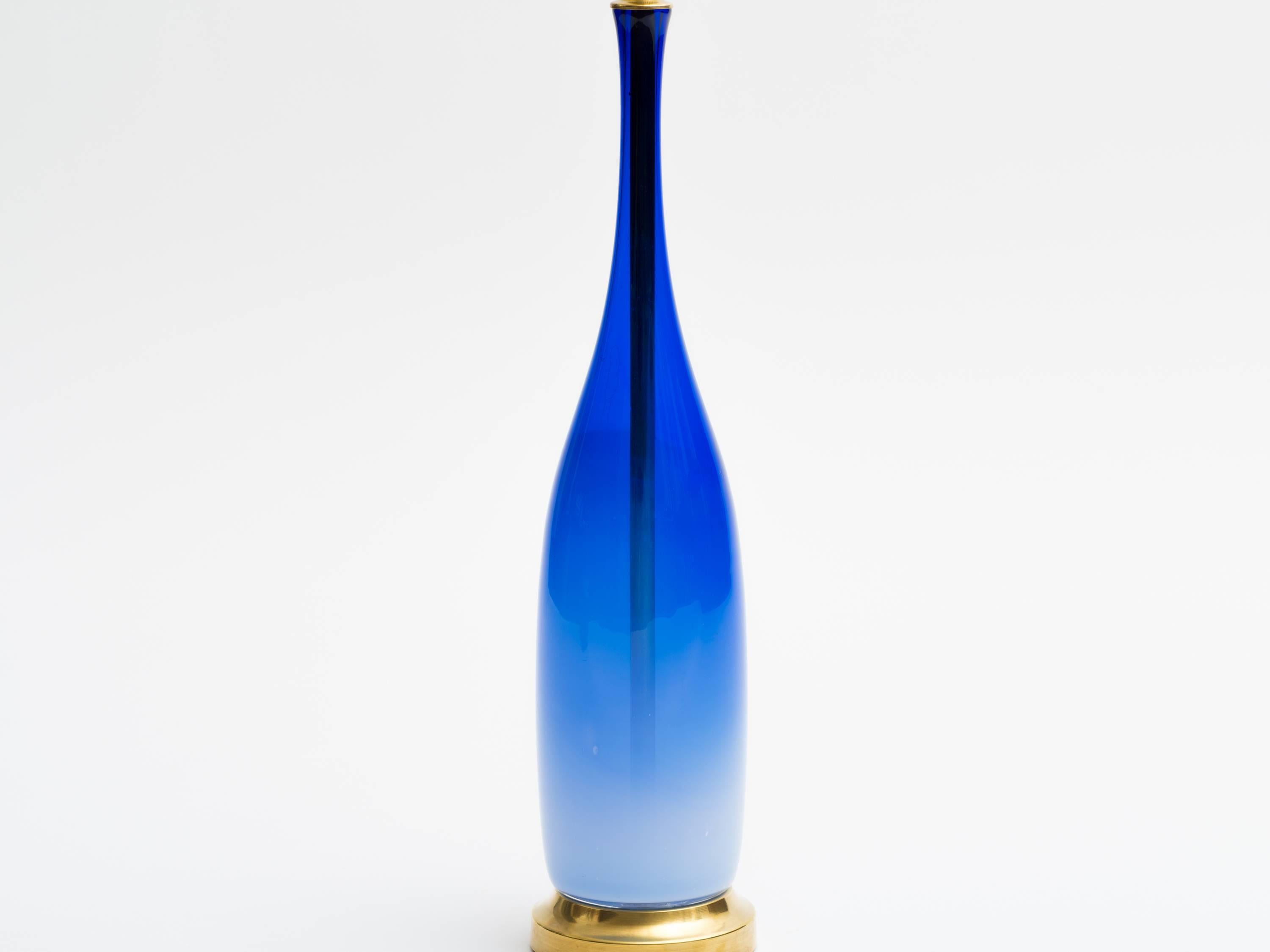 Leerdam Unica blue ombre glass bottle form lamp by glass master Floris Meydam, Netherlands, circa 1950s. Original brass lamp base. Rewired with new solid brass lamp hardware.