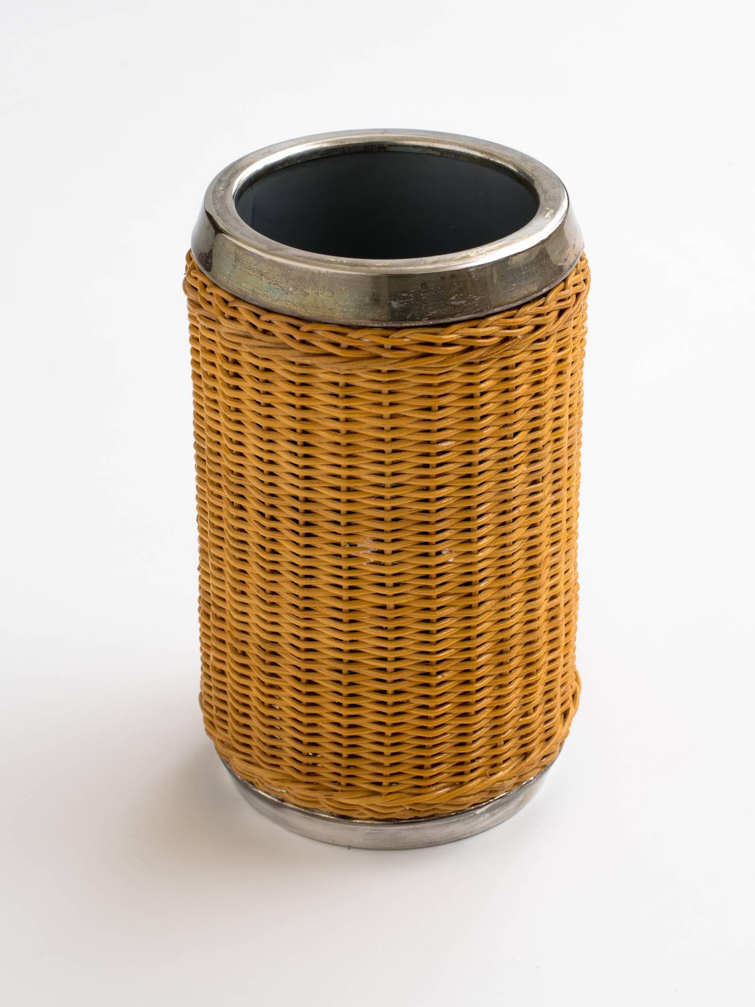 Gucci wicker wine cooler with silver plated rim and bottom. Stamped, Gucci. Made in Italy.