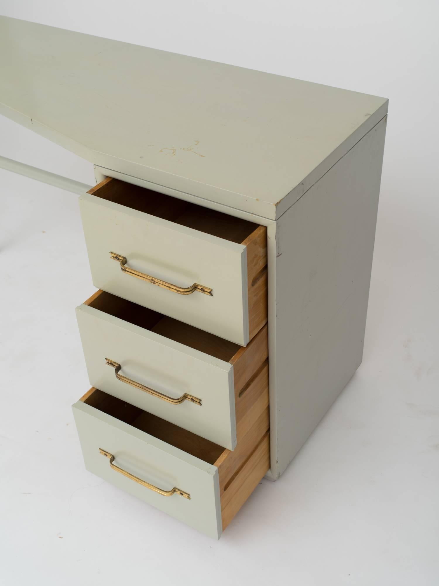 20th Century Tommi Parzinger Style Celadon Lacquered Desk with Signature Brass Ribbon Handles For Sale