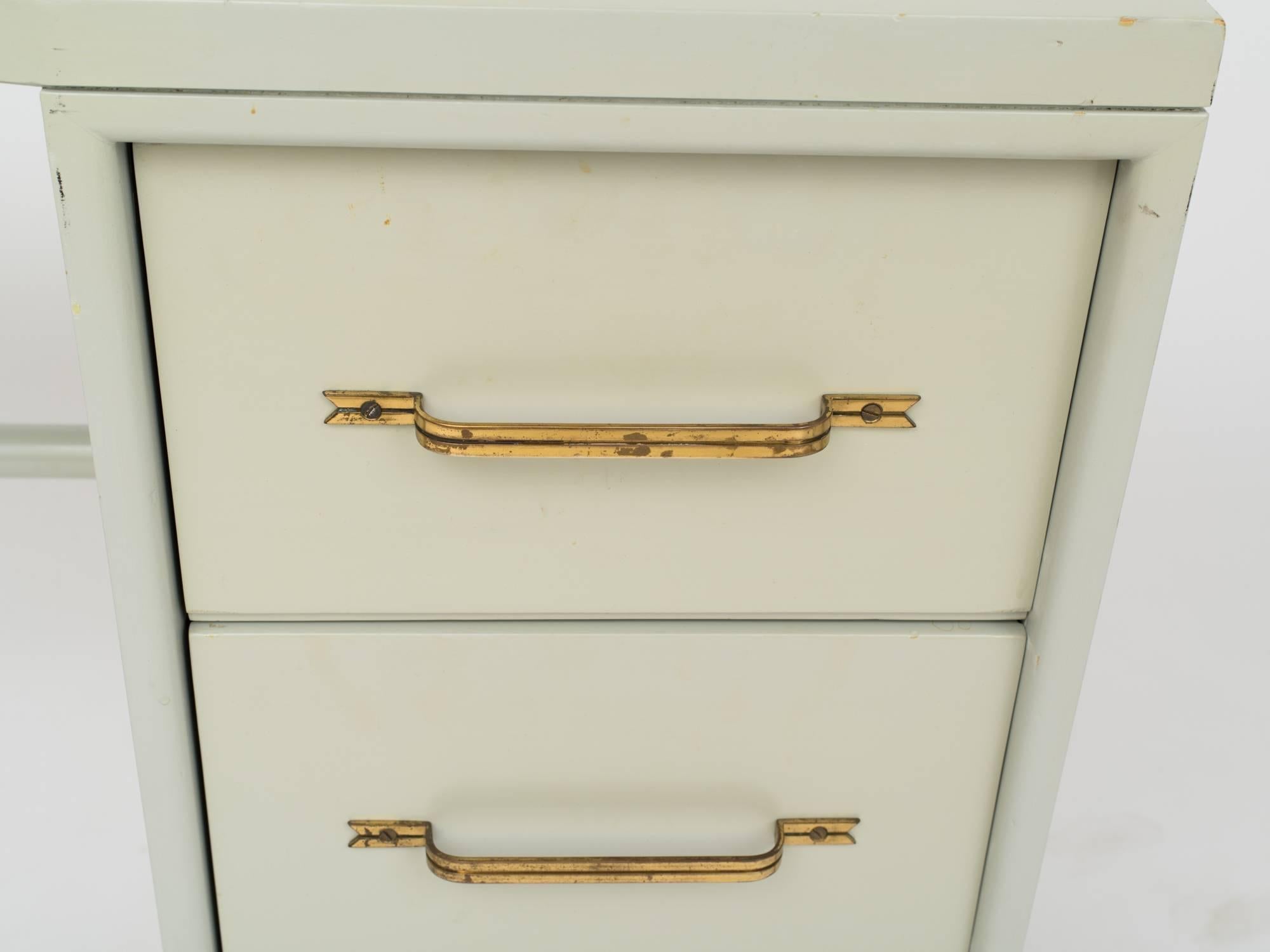 American Tommi Parzinger Style Celadon Lacquered Desk with Signature Brass Ribbon Handles For Sale