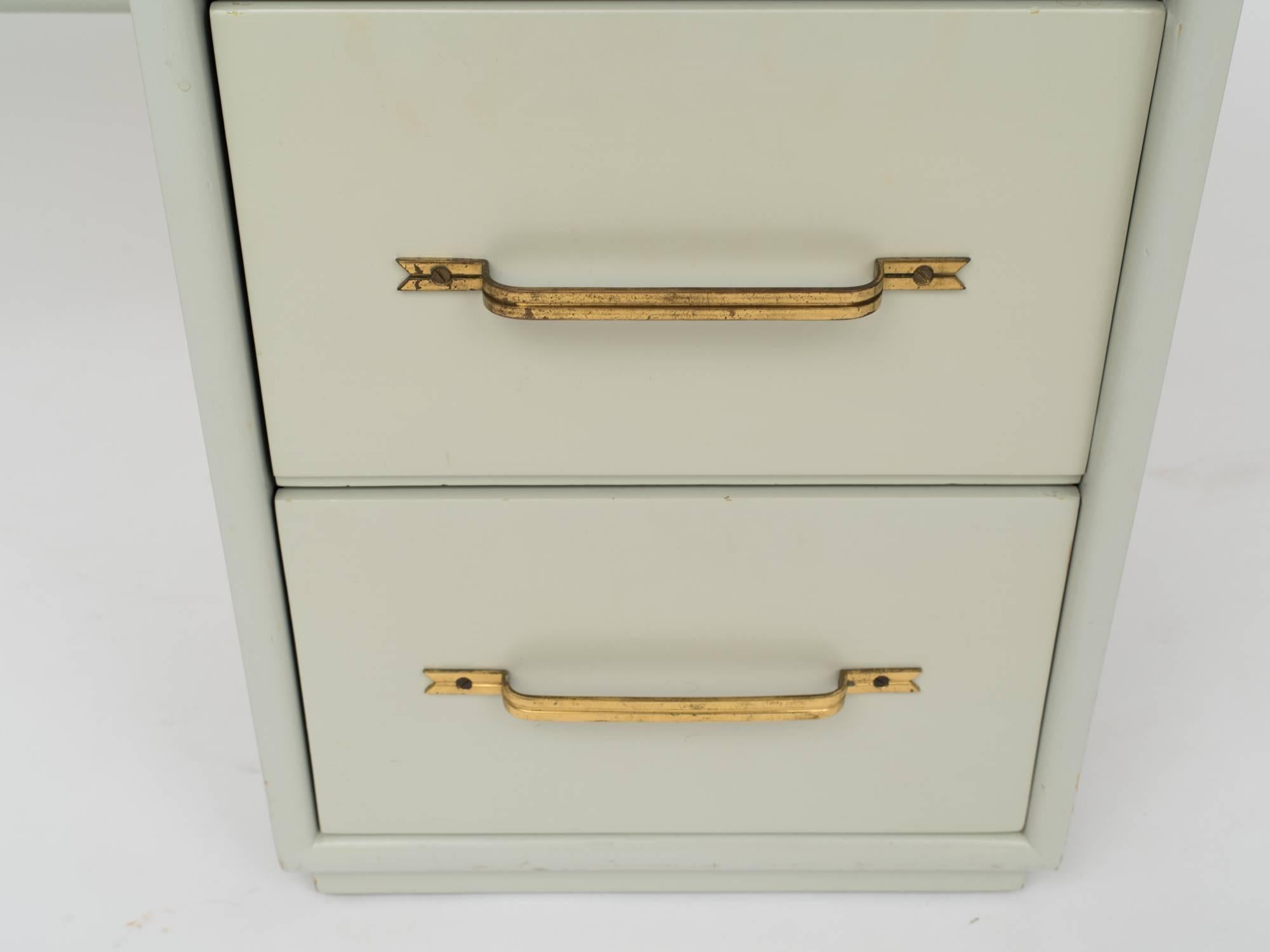 Tommi Parzinger Style Celadon Lacquered Desk with Signature Brass Ribbon Handles In Fair Condition For Sale In New York, NY