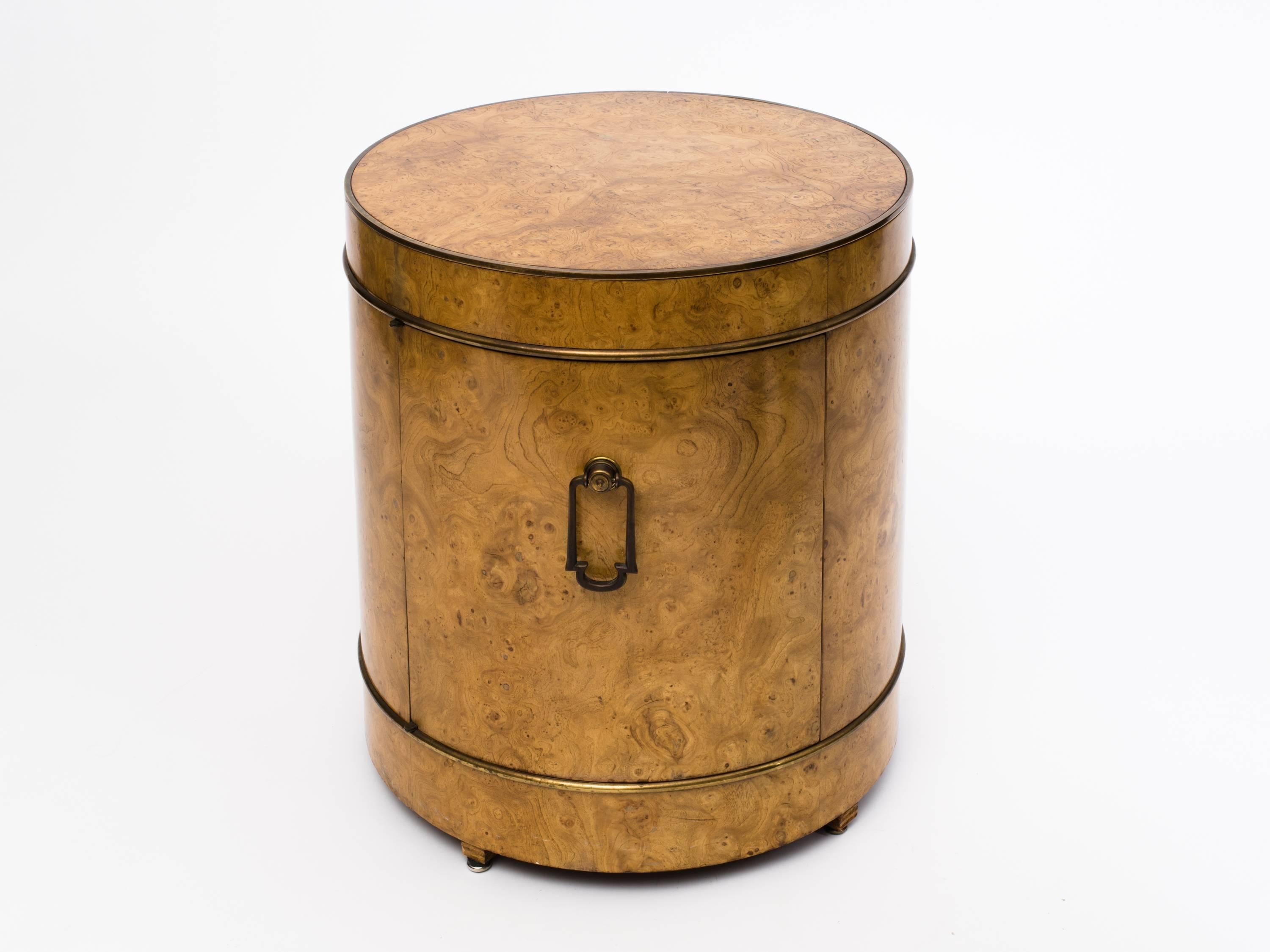 Rich burl wood drum bar cabinet with brass piping detail and heavy brass door pull. Designed by Bernhard Rohne for Mastercraft, circa 1970s.