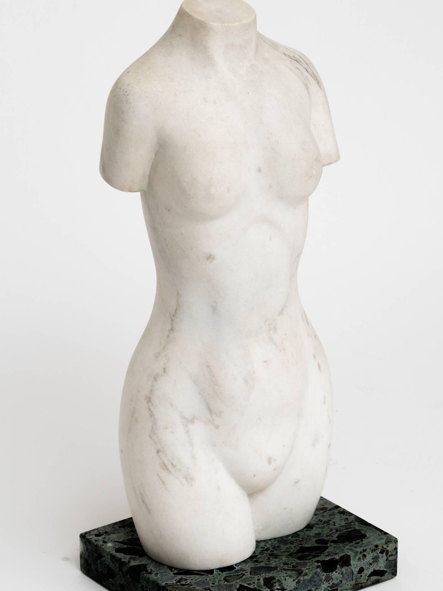 Classical modern marble female torso sculpture on green marble base by master sculptor Shi Jia Chen. Signed and dated 1993.

Shi Jia Chen was born in China. In 1980 he left Shanghai for the United States to pursue his study in sculpture. 
Upon