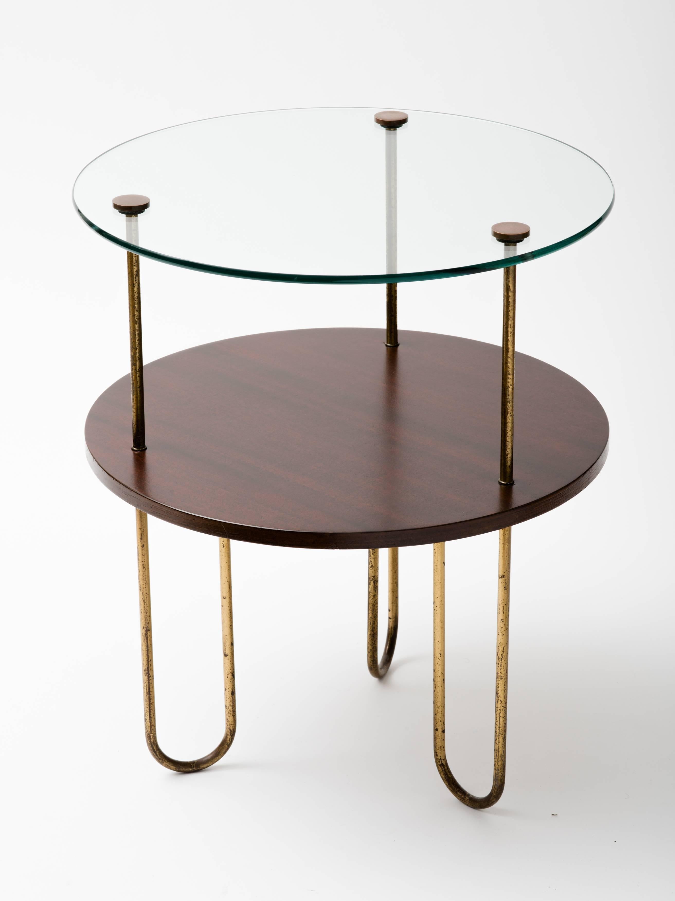 Original Art Deco circular walnut gueridon with curved hairpin legs. Copper hardware attaches glass top to table. Metal legs have distressed patina, which gives table authenticity.