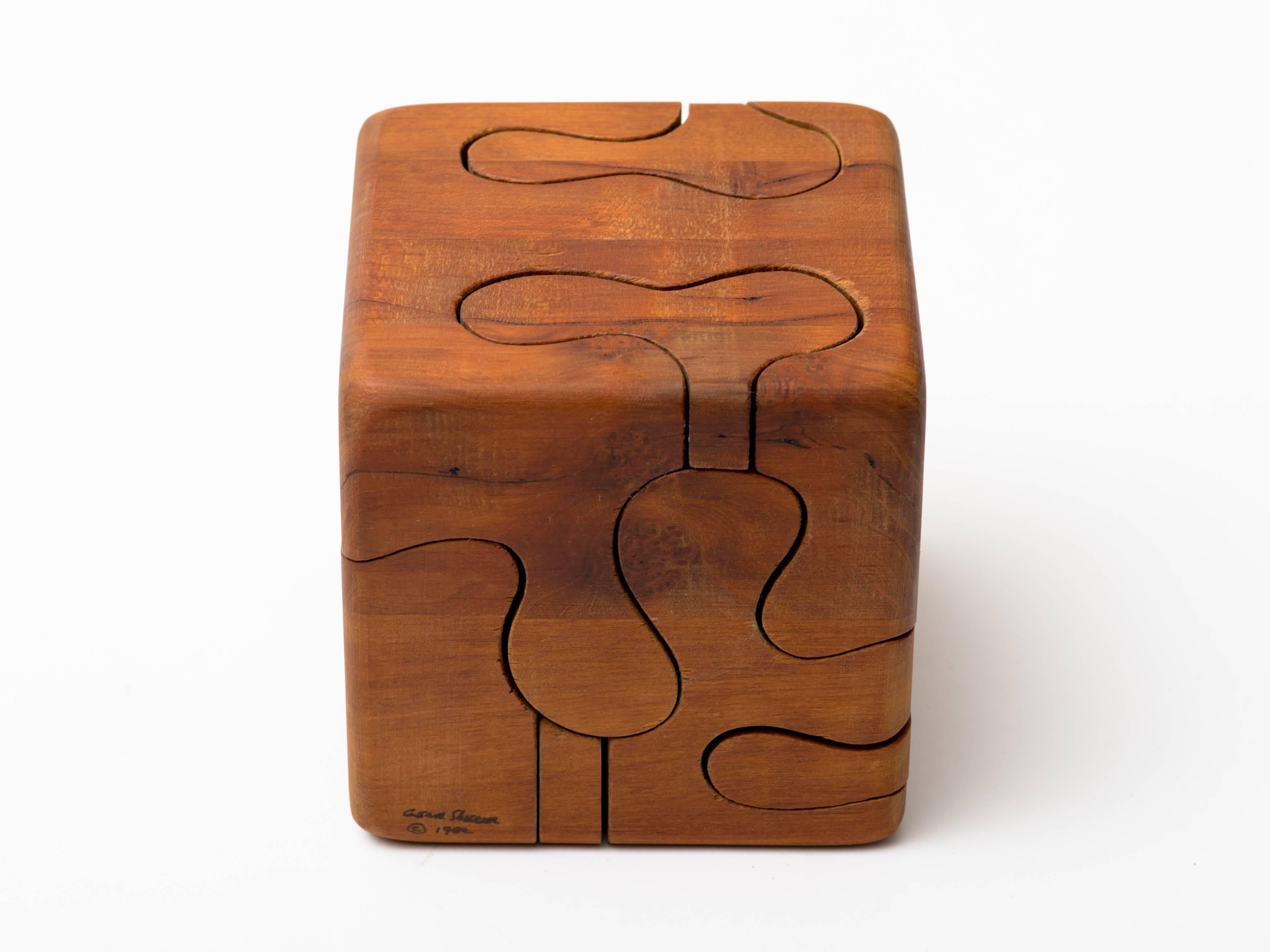 Handcrafted wooden cube puzzle, signed Gene Sherer, 1982.