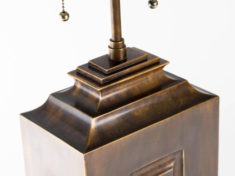 Monumental patinated brass Hollywood Regency lamp. Lamp body measures 24.5