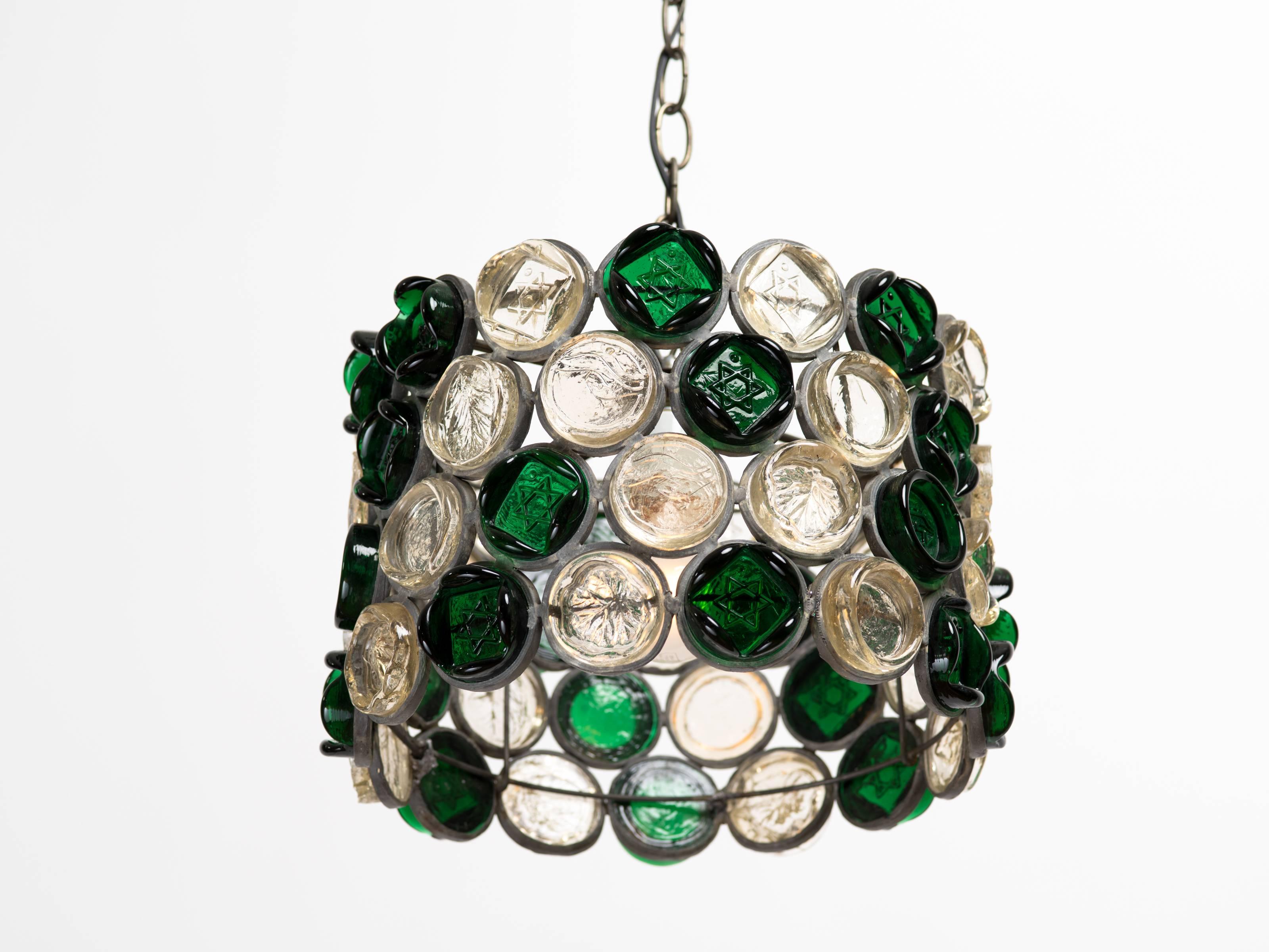 Studio crafted glass disc drum chandelier with alternating leaf and Star of David motifs. Hand wrought metal chandelier body measures 13.75 inches diameter x 9 inches height, with chain, 36.5 inches overall. Height adjustable by adding or removing