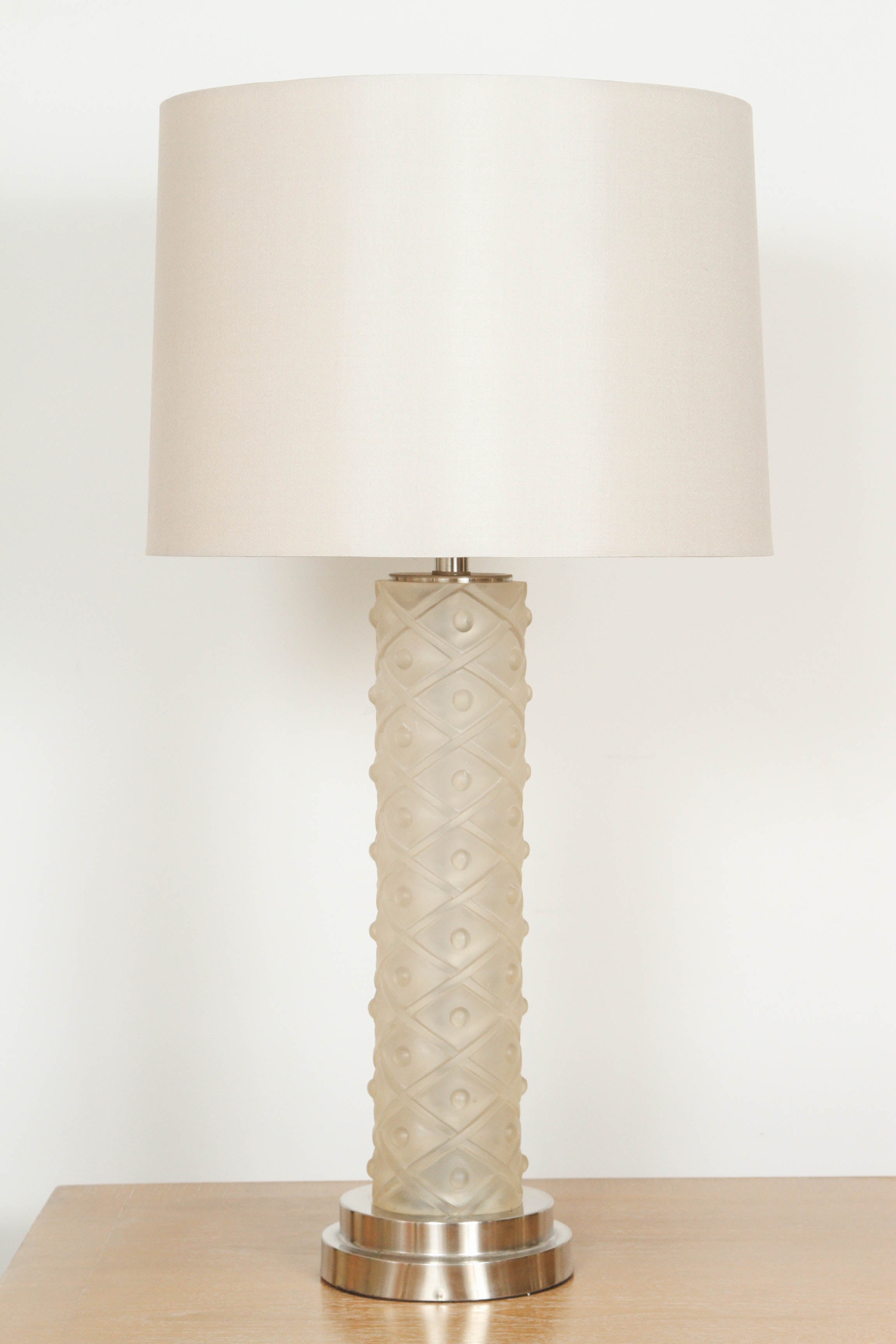 Vintage table lamps made of cast resin in excellent condition with custom silk shades.  Recently rewired.  