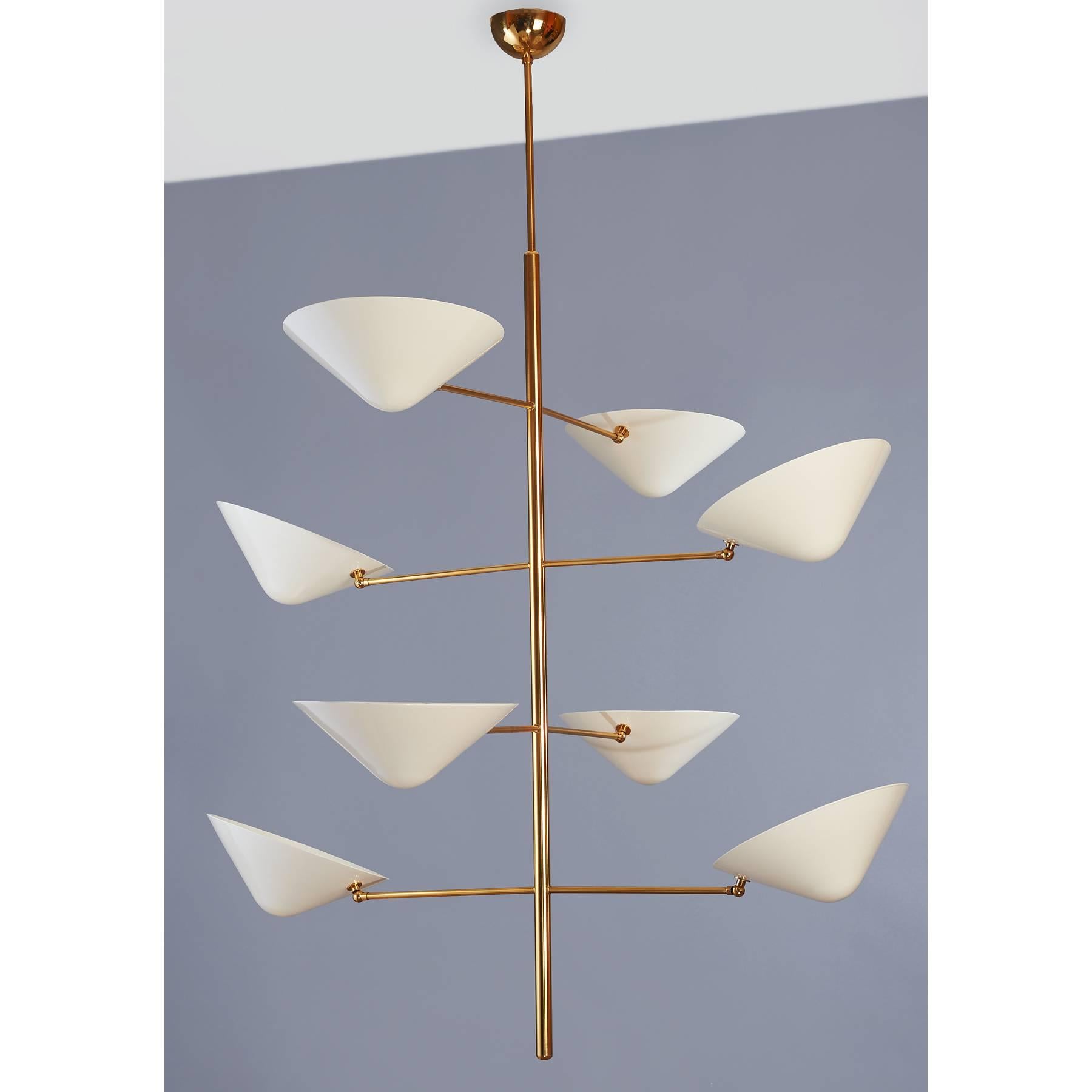 Italy, contemporary
An impressive eight branch polished brass pendant light fixture with adjustable cream enameled metal shades
Dimensions: 49 D x 63 H  

