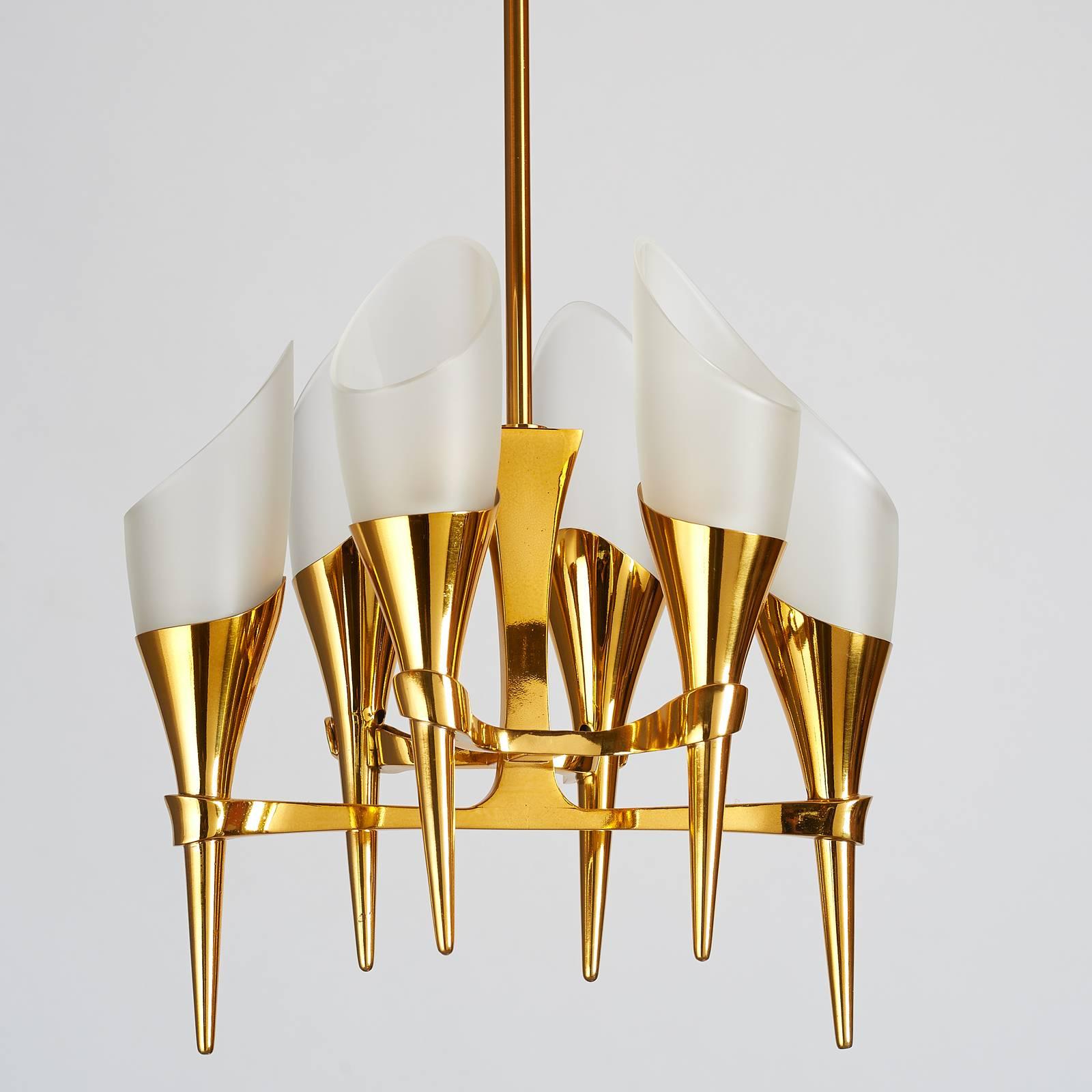 Max Ingrand ( 1908-1969 ) for Fontana Arte.
Exceptional six branch chandelier in polished bronze with sculpted arms
and frosted bias cut-glass shades,
Italy, circa 1960.
Dimensions: 14 x 10 x 36 H as shown, body 15 H.
Rewired for use in the U.S.A.