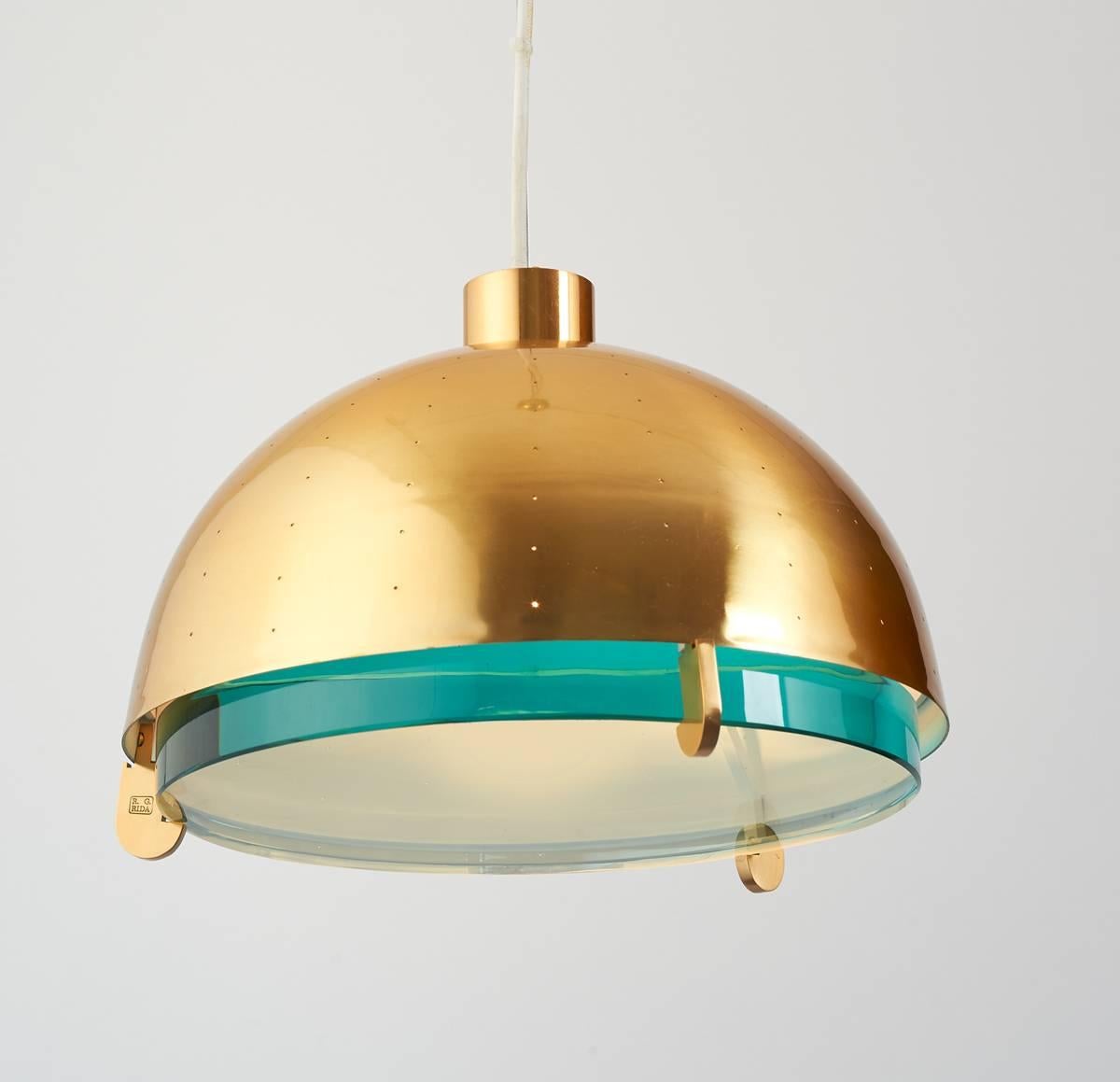 Roberto G. Rida (b. 1943).
Limited edition of four adjustable lanterns in perforated brass with 1 inch ground glass lens, after a model of Max Ingrand.
Signed on mount,
Italy, 2016.
Measures: 12 diameter x 8 H + canopy and adjustable wire.
One