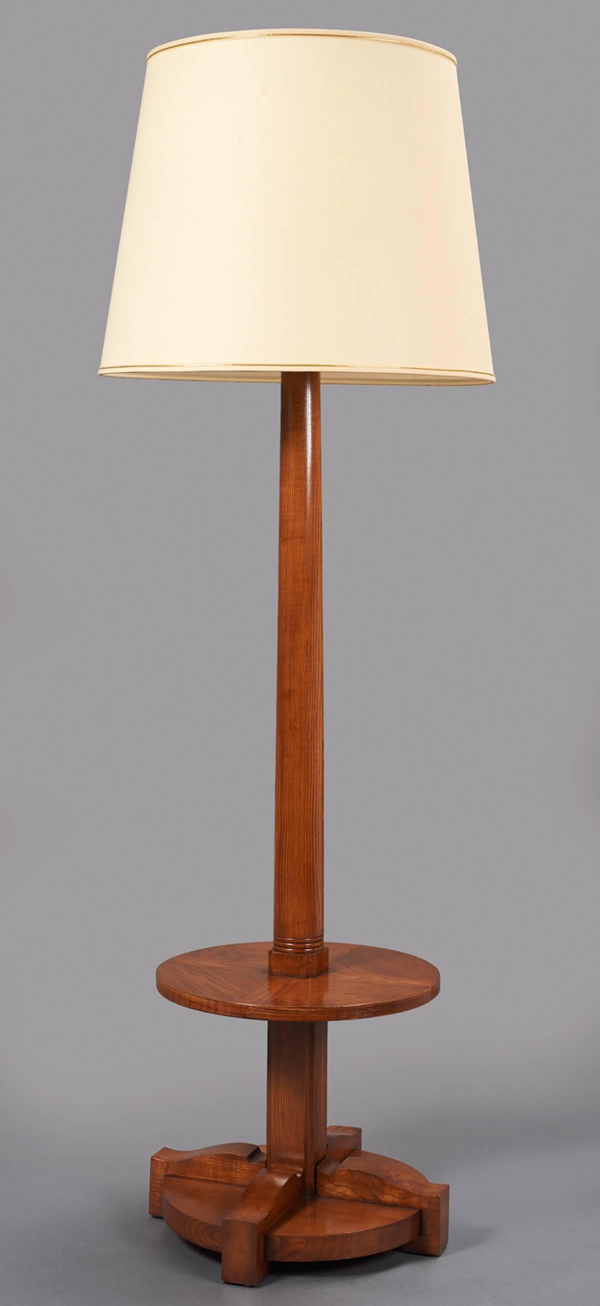 France, 1950s.
Handsome tall mahogany stained ash tapered standing lamp
with detailed mounts and tray table.
Rewired for use in the USA with three standard base bulbs.
Measures: 74 H x 24 diameter with shade/18 diameter at base.
   
        