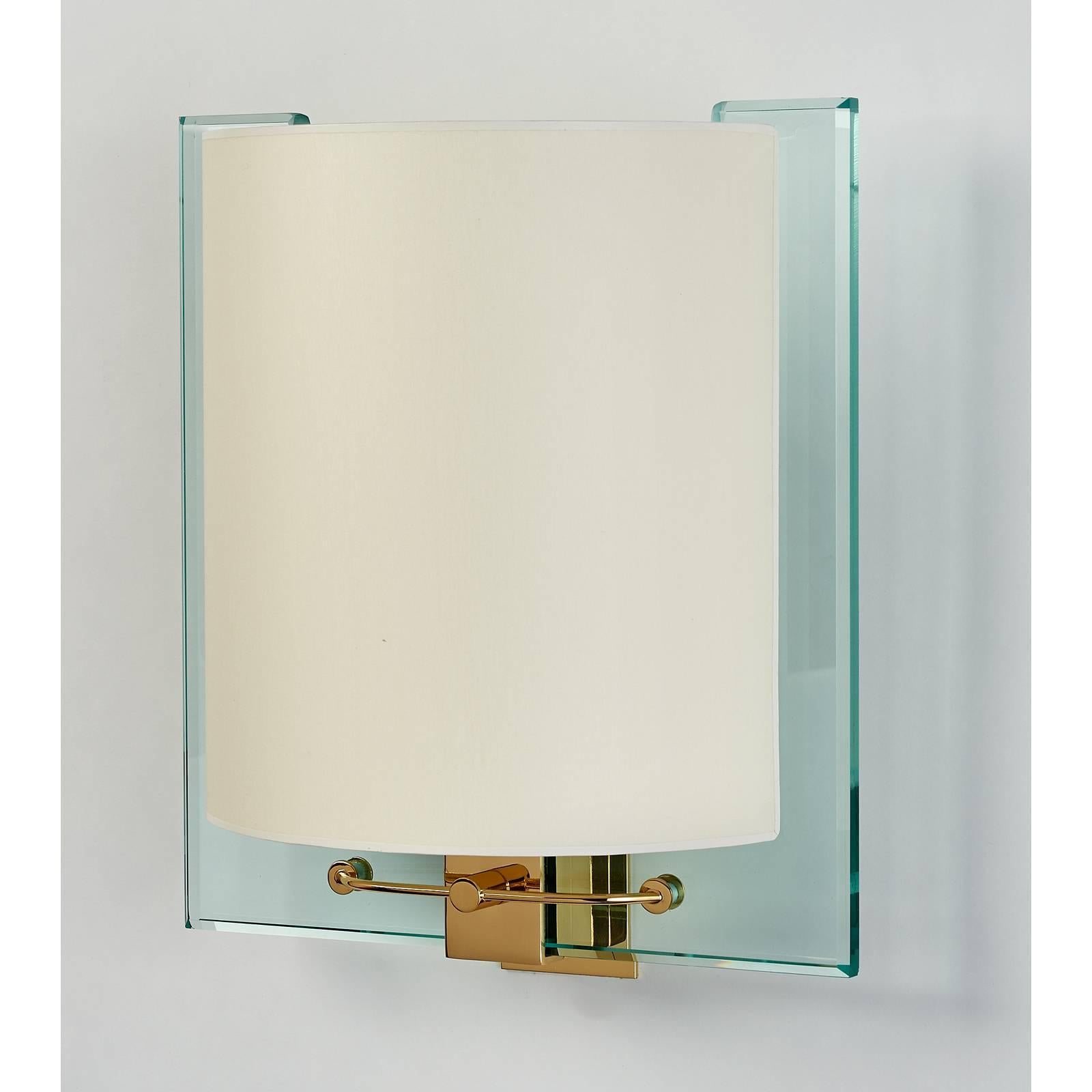 Nathalie Grenon for Fontana Arte.

A stunning pair of Fontana Arte glass and polished brass sconces, designed by Nathalie Grenon for Bulgari in 1990.
Rewired for use in the USA.
Measures: 13.5 W x 15 H x 7 proj.