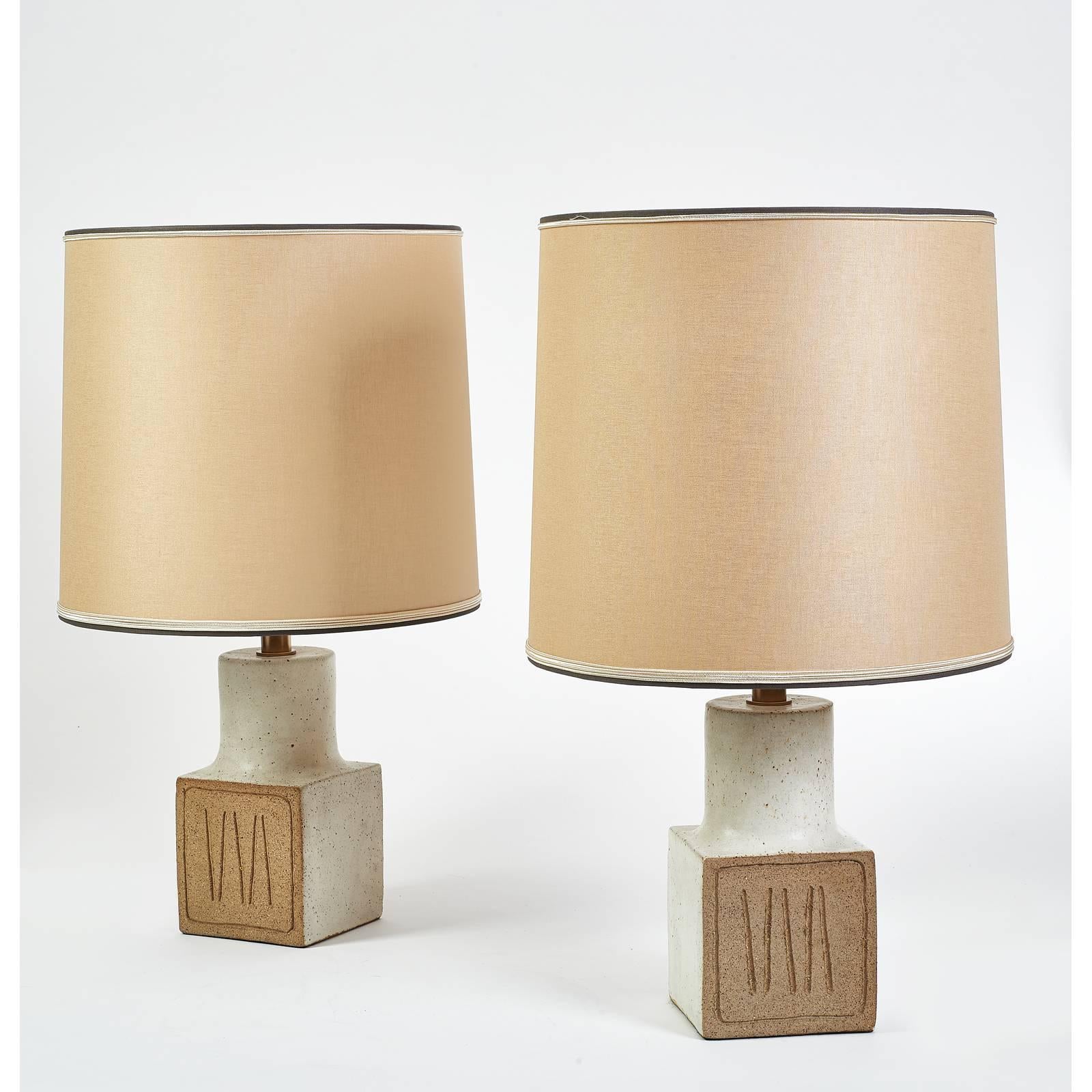 Bruno Gambone (b. 1936).
Pair of glazed and raw ceramic table lamps with etched geometric decor.
Italy, 1970s.
Rewired for use in the USA.
Dimensions: 20 H x 12 diameter.



   