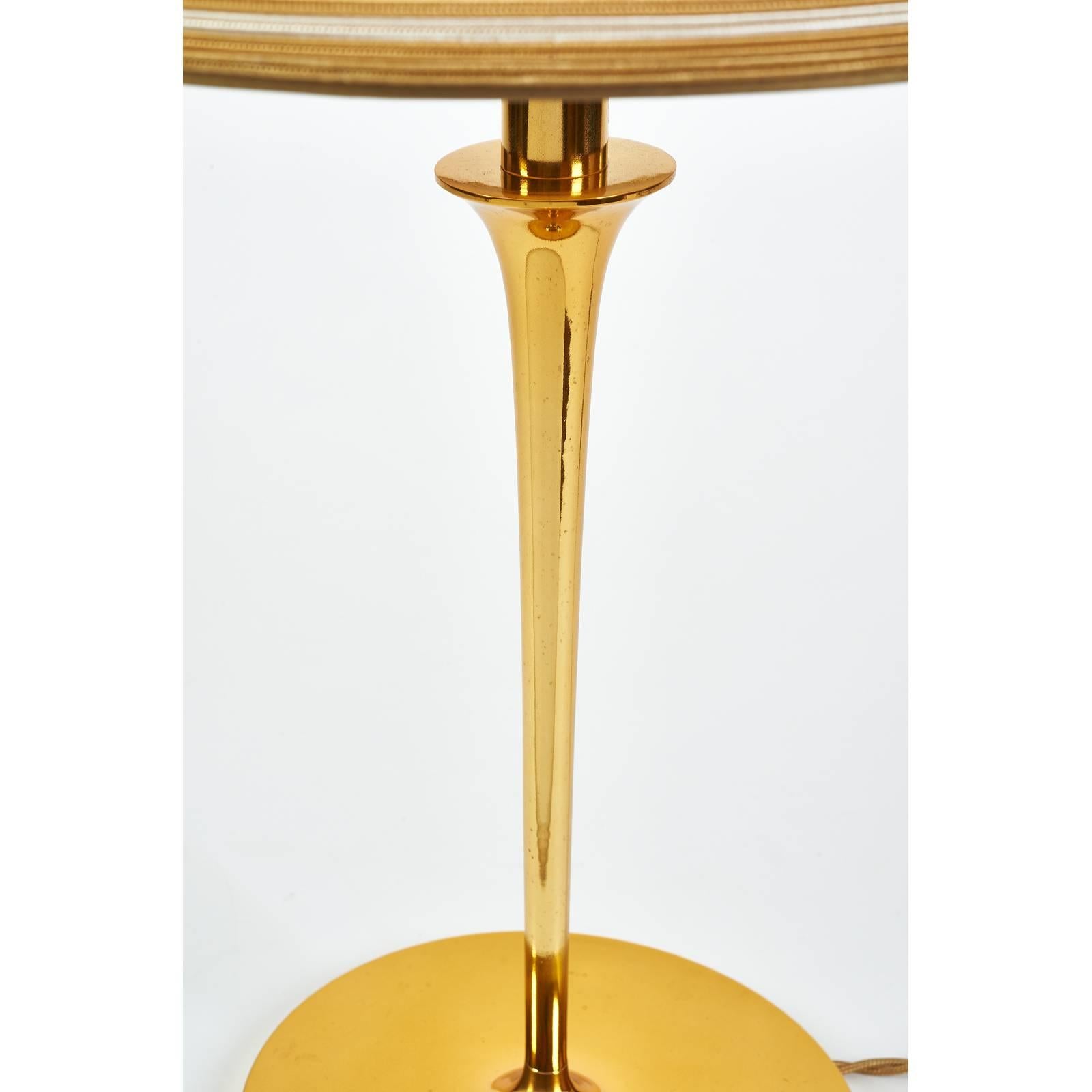 France, 1970s.
Table lamp with tapering shaft and shaped base 
polished brass.
Rewired for use in the USA with one standard base bulb.

Measures: 13 Ø x 27 H.
 