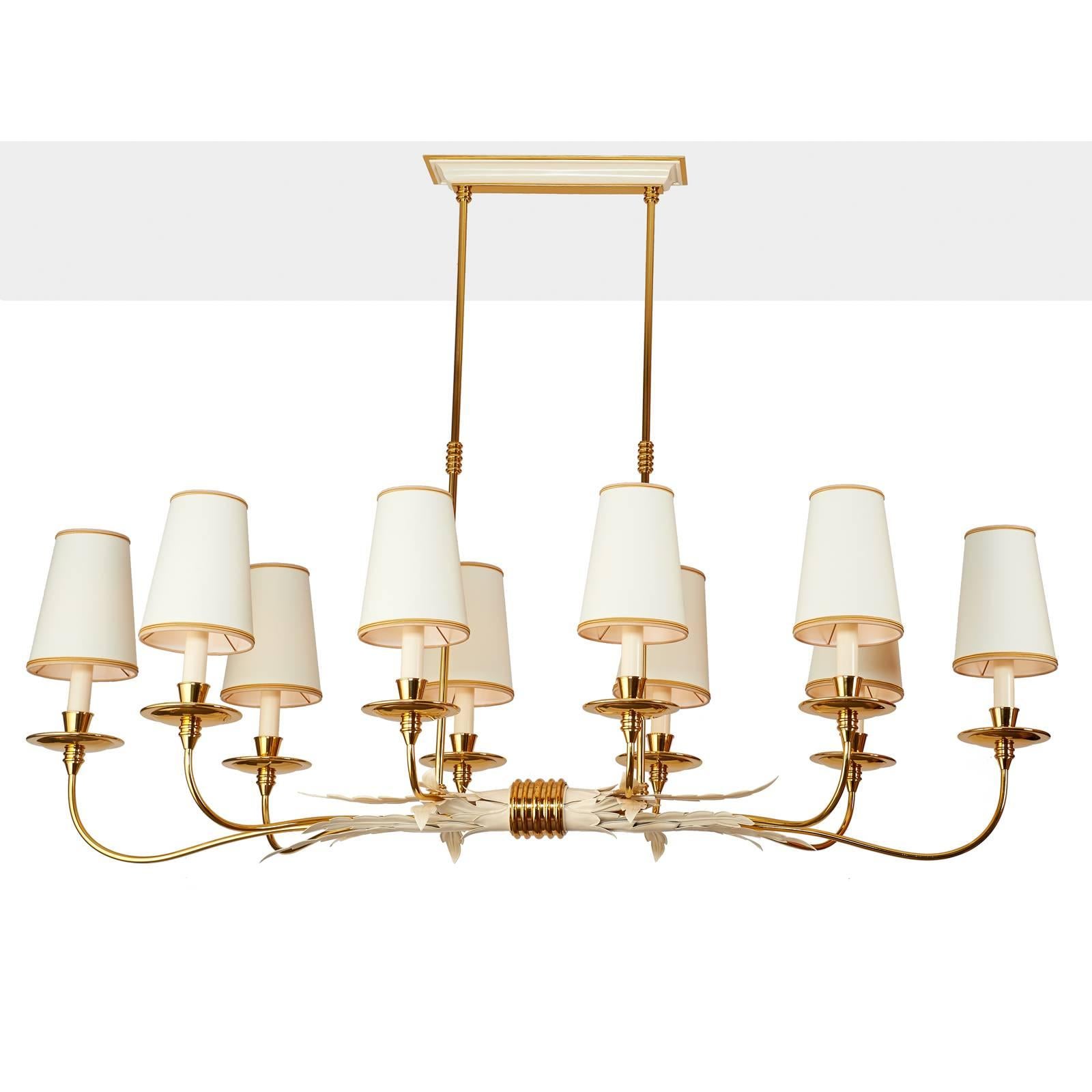 Italy, 1950s.
An elegant ten branch chandelier with rich foliate decor, polished ringed brass mounts at center gathering and on shafts.
Rewired for use in the USA.
58 x 21 x 42 H (Height adjustable).