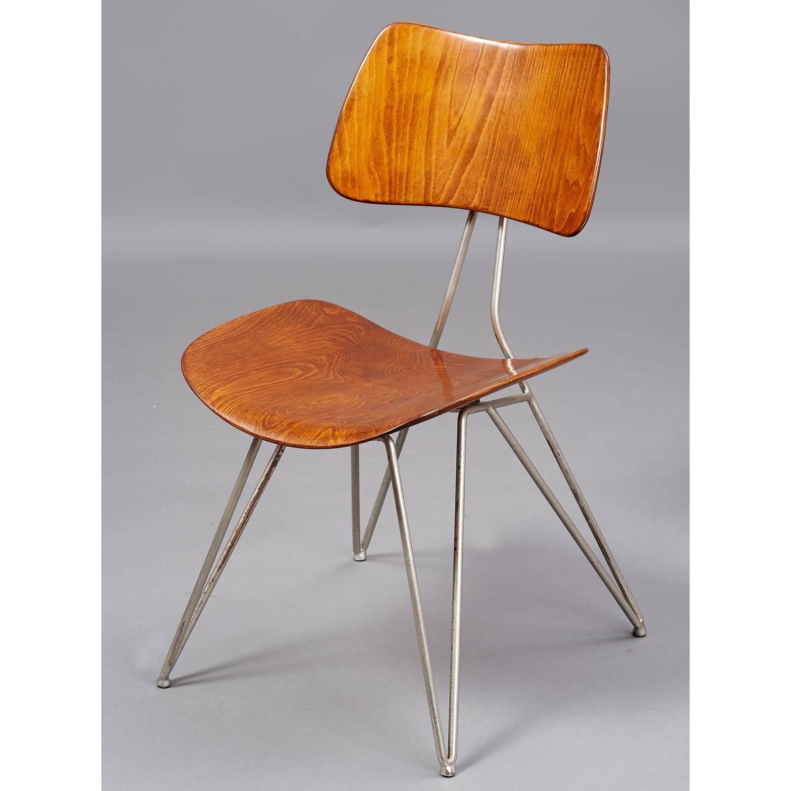 Gastone Rinaldi with Gio Ponti
Sculptural modernist chair, Model Du 10 for Rima
Bent plywood, chromed steel
Italy, circa 1951
Measures: 18 W x 23 D x 17/32 H.