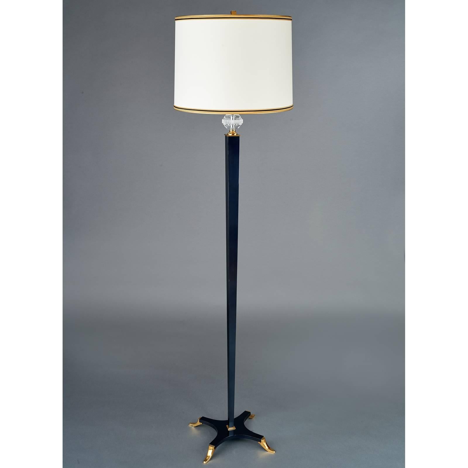 DOMINIQUE
Andre Domin (1883-1962) and Marcel Genevriere (1885-1967)
Exceptional neoclassical floor lamp in gunmetal and gilt bronze with sharply tapered shaft and belted perspex globe ornament, France, 1950s 
Dimensions: 69 H x 17 diameter. Rewired