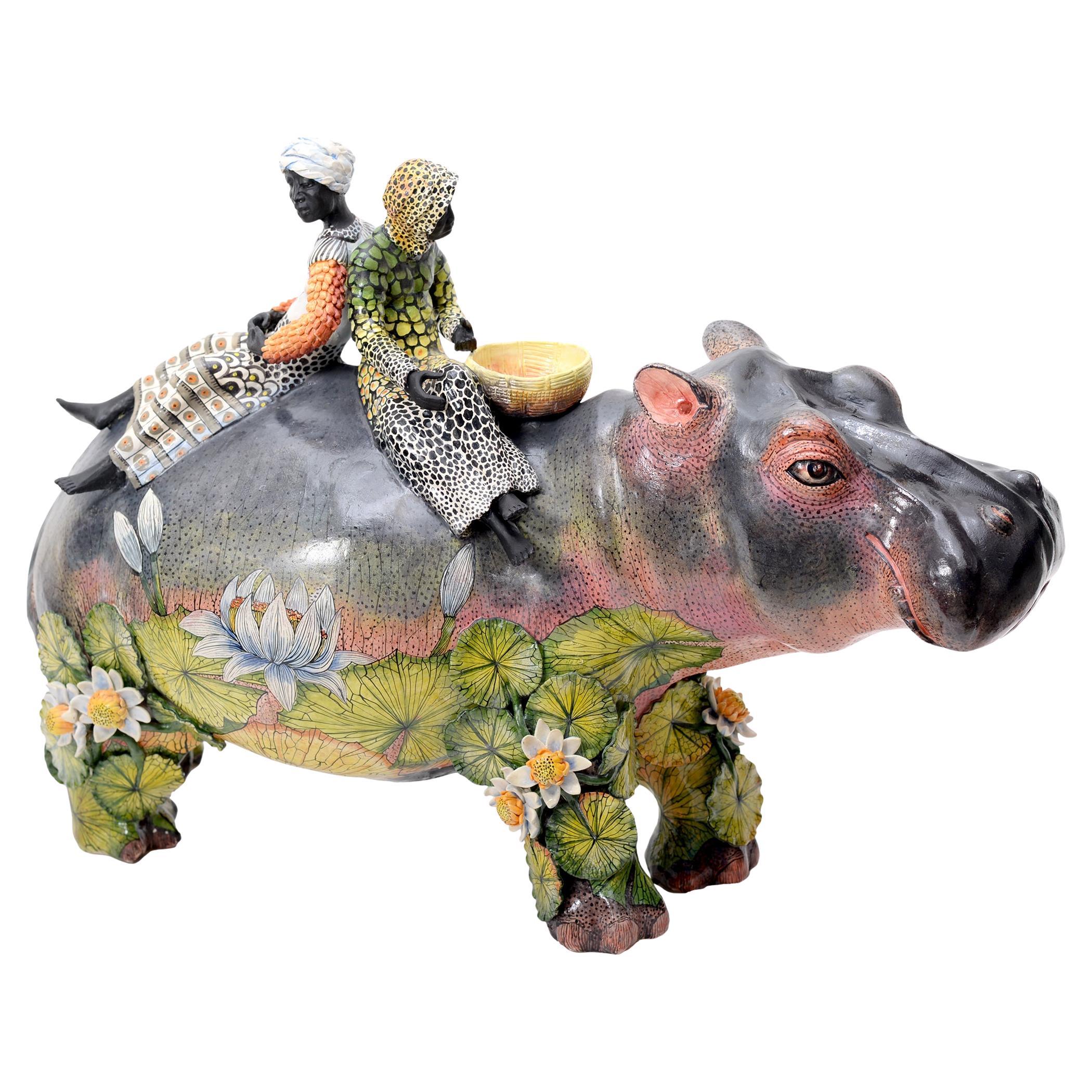 Scultura a cavaliere con ippopotamo e ninfee, realizzata a mano in Sudafrica in vendita