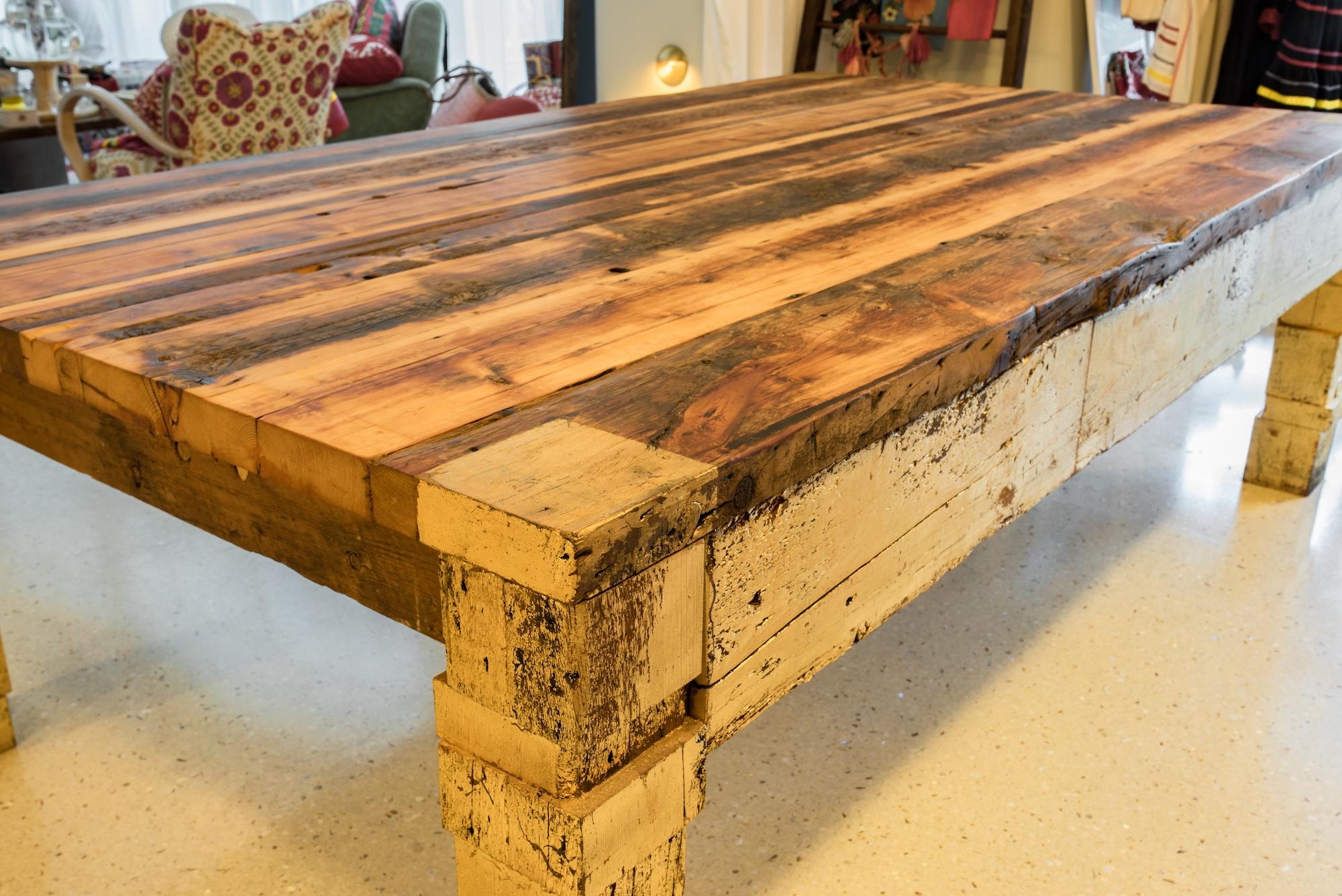 Rafael designed and handcrafted the Gilt Block Dining Table from the reclaimed 150-year-old Douglas fir beams he salvaged from Manhattan townhomes. Their surfaces are aged with a beautiful golden brown patina; saw marks, nails, bolt holes, and